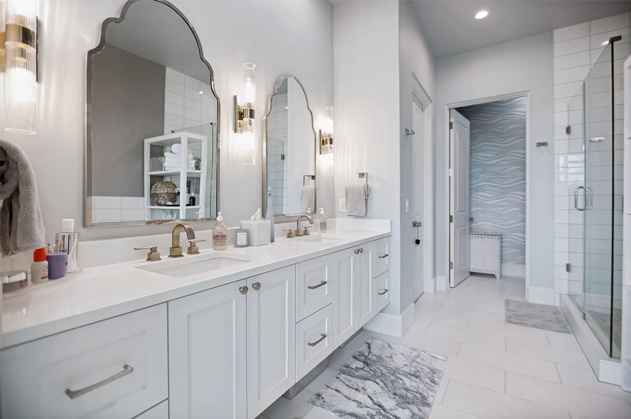 The primary bath is a true spa-like sanctuary for relaxation