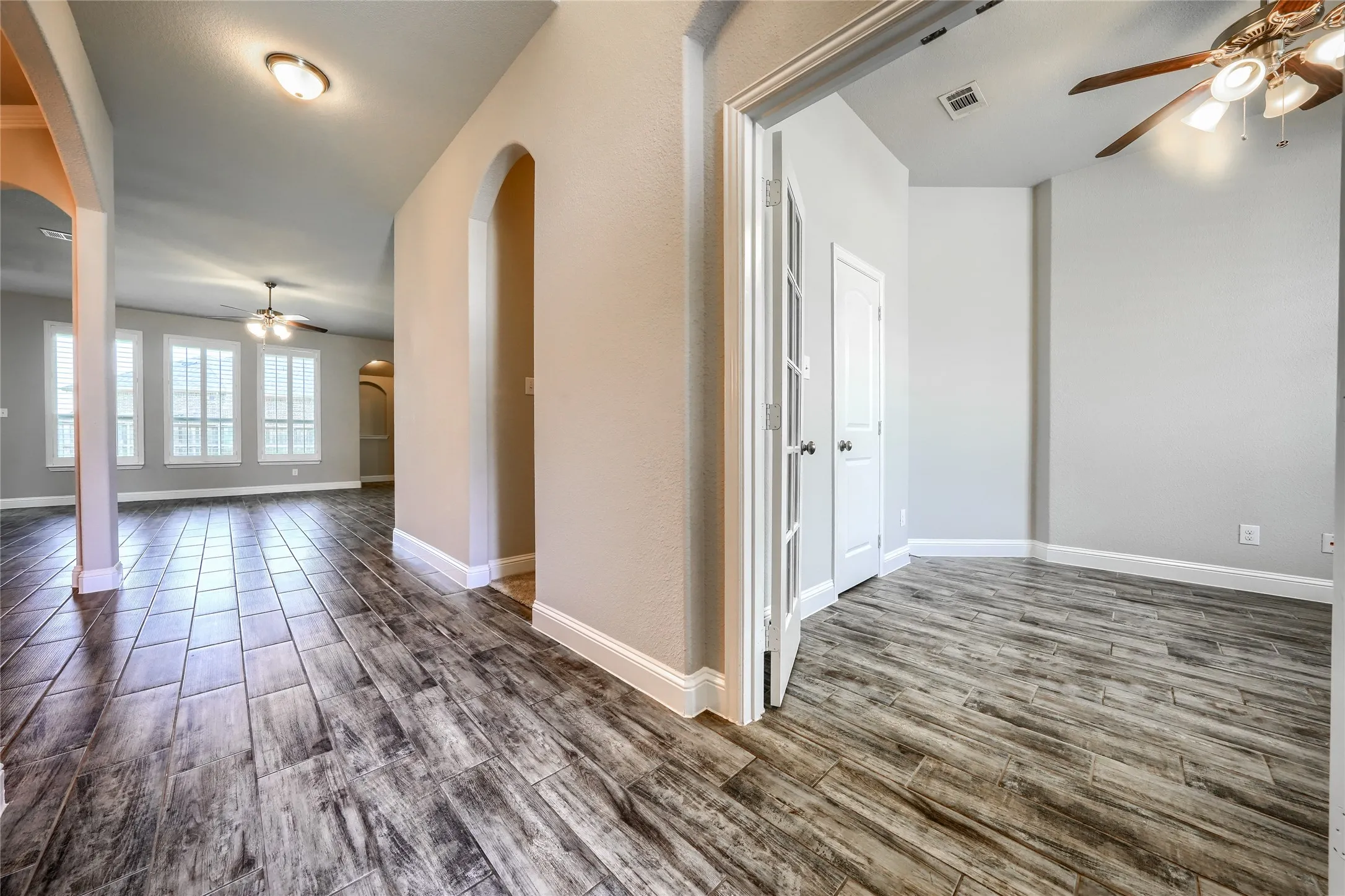 Entrance with flex room on the right. Could be home office or 4th bedroom.