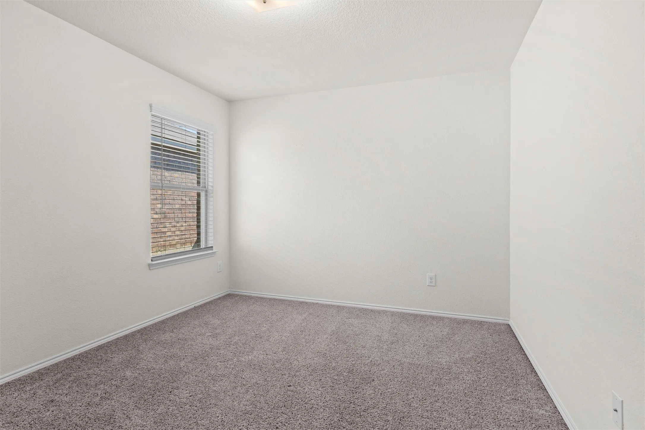 Perfect for a kids' room, guest space, or a dedicated home office! This secondary bedroom features a large window for great natural light, cozy premium carpet, and its own storage closet.
Tags: #GuestRoom #HomeOffice #NurseryIdeas #BrightSpaces