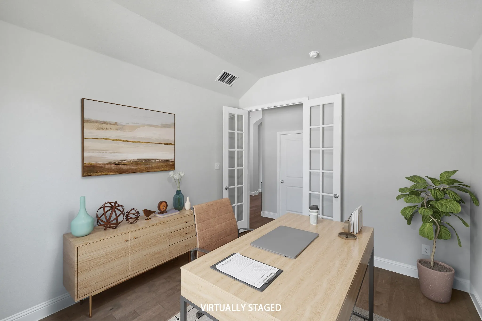 Generous sized office or 5th bedroom at the front of the home. Virtually staged photo.