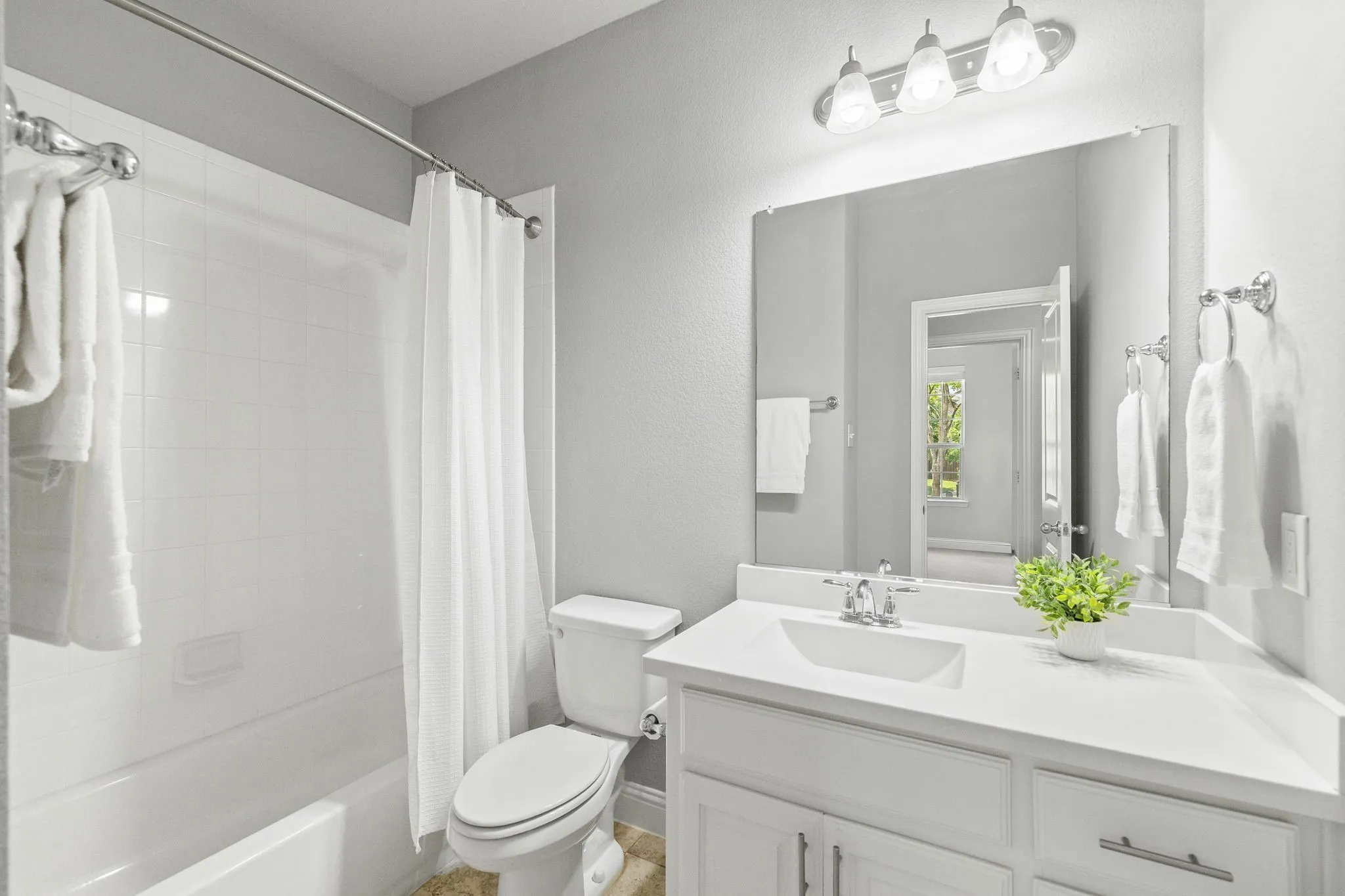 Full bathroom at the front of the home.
