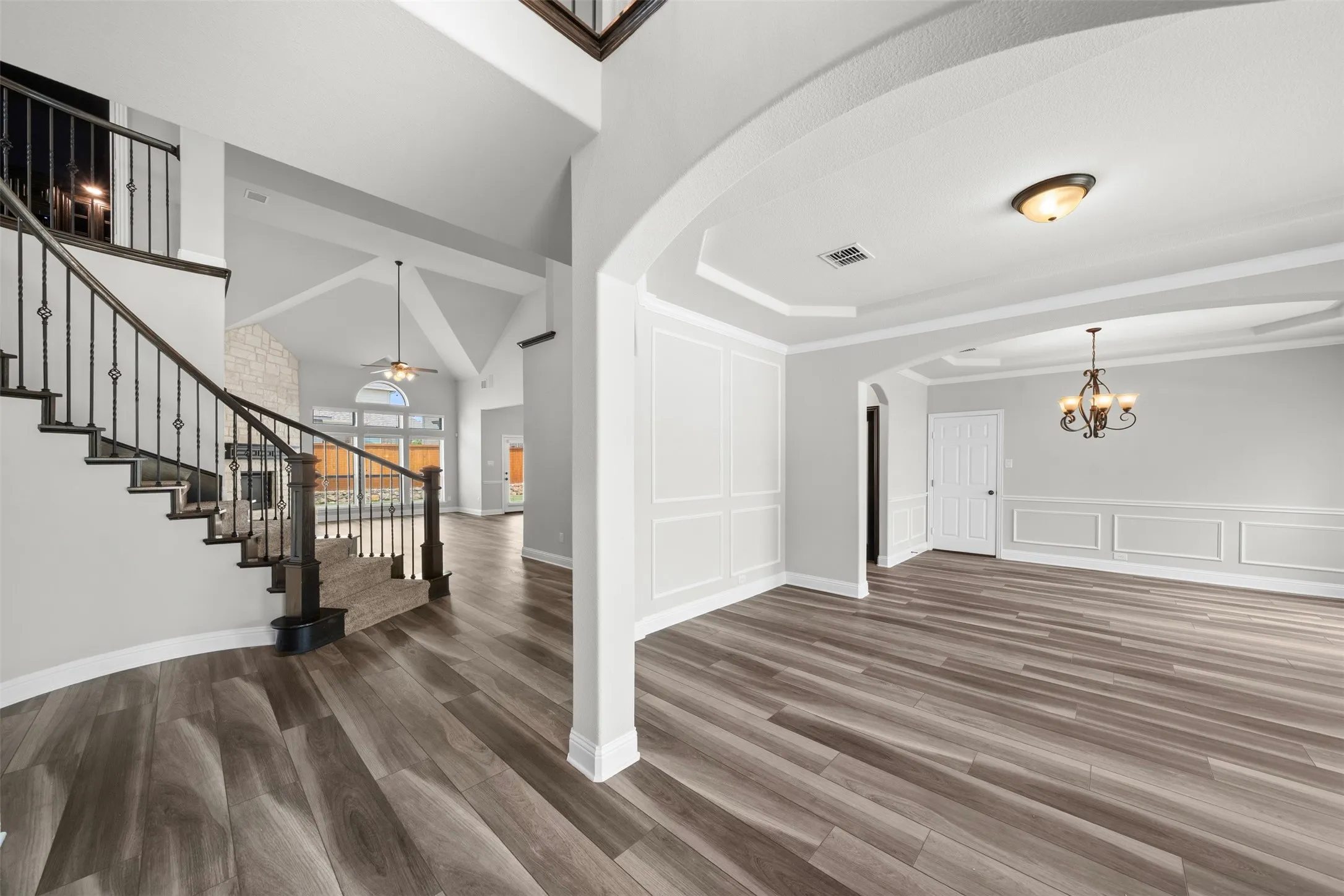 Entry, informal living area, formal dining .