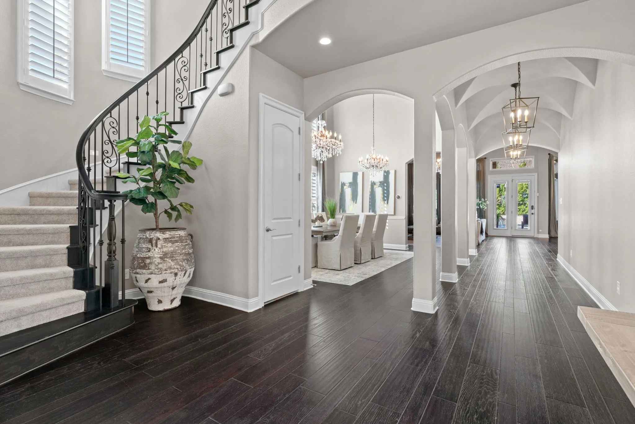 Grand Luxury Entrance with curved staircase
