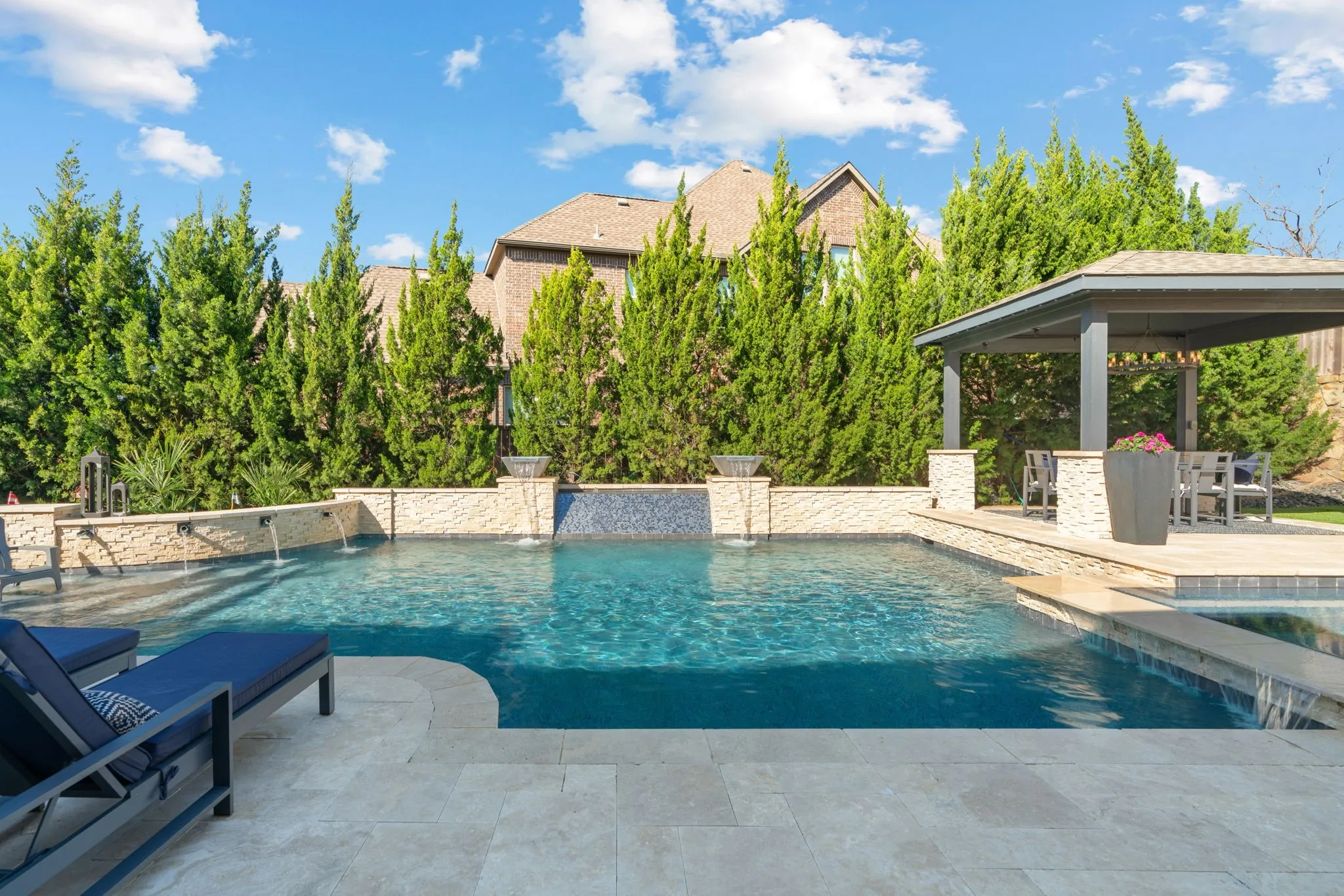 Great size pool with private mature trees that surround for all year around privacy