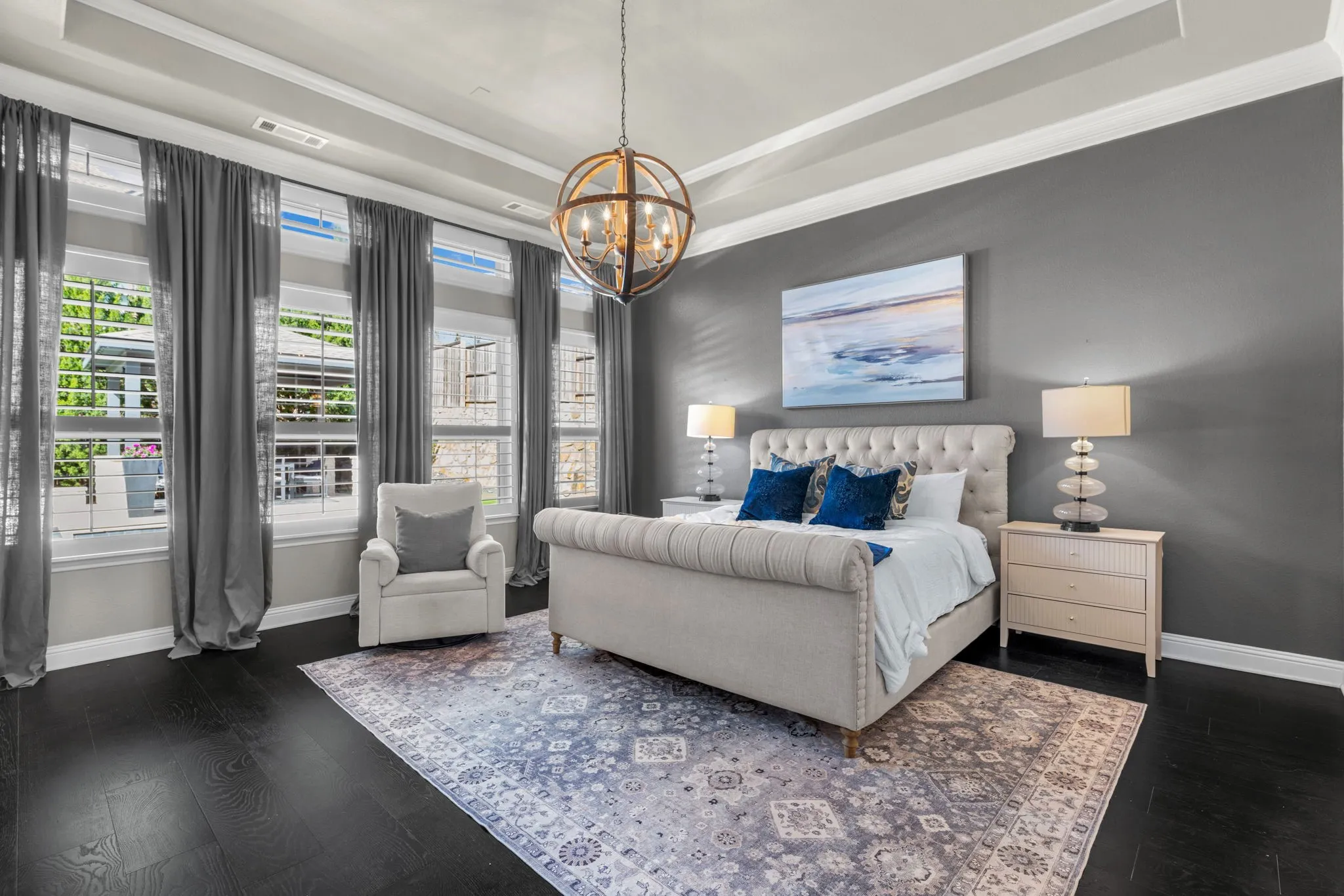 Master bedroom features his and hers closests