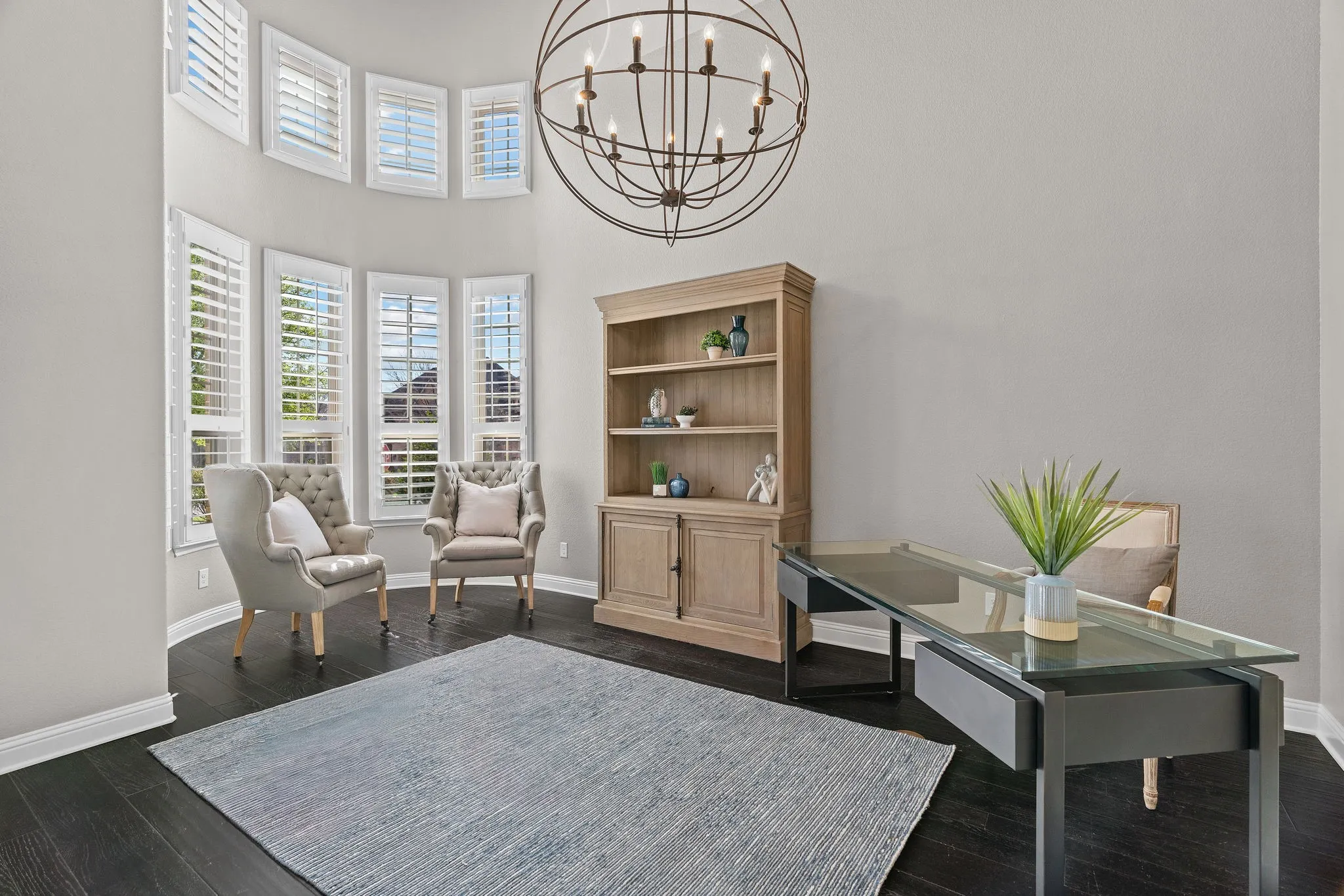 Huge Office with tons of natural lighting and up at the front of the home