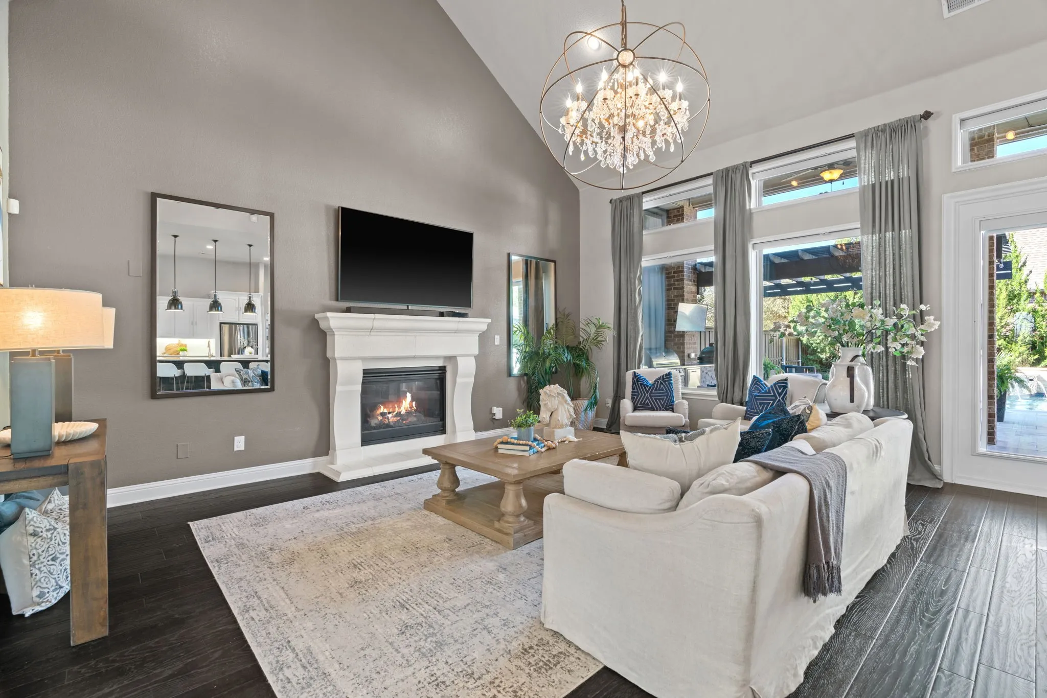 Open to kitchen area and views of your oasis of a backyard