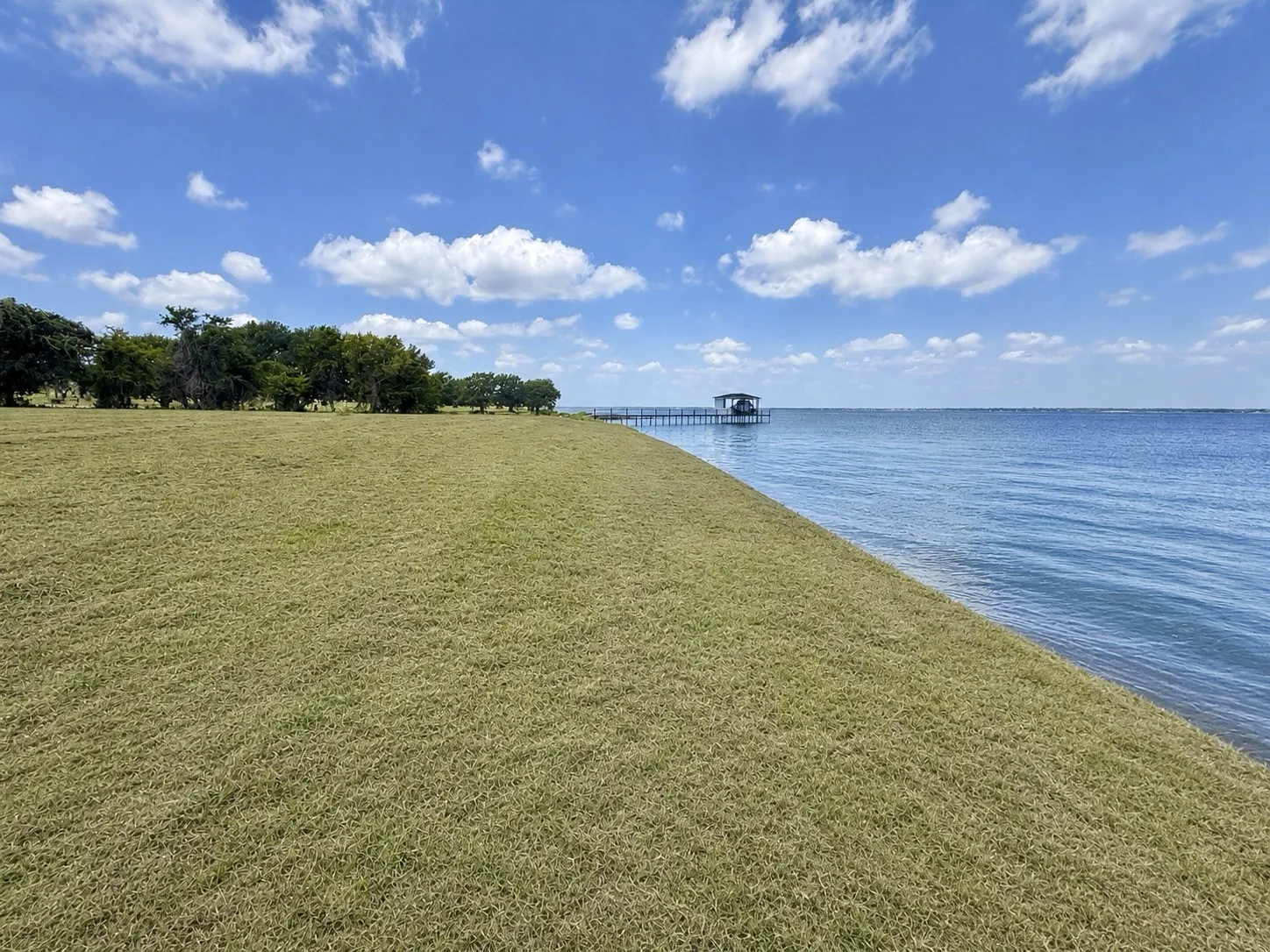 Build your custom lakefront home with breathtaking open water views and 245 feet of shoreline.