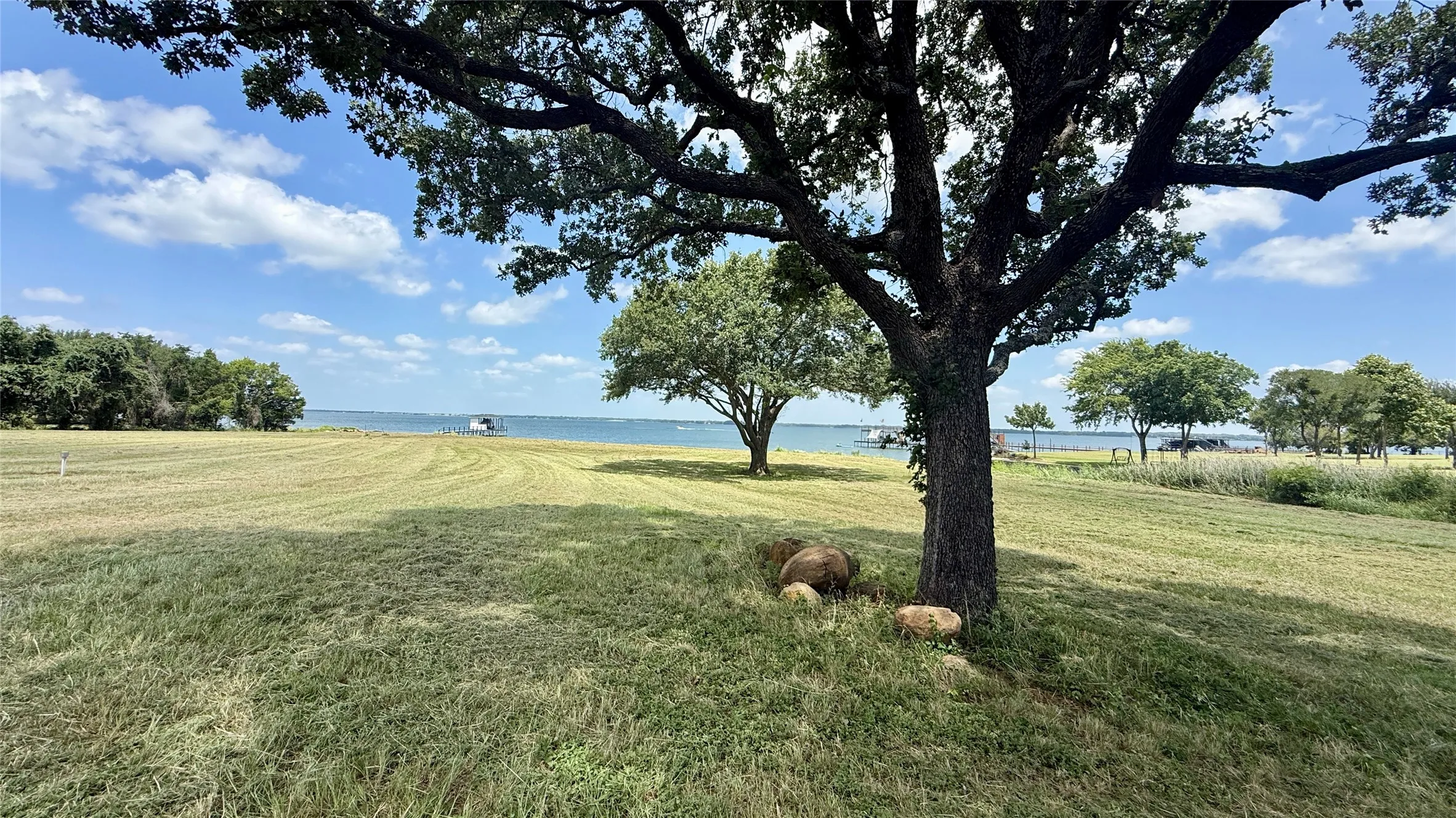 Majestic oak trees provide natural beauty and welcome afternoon shade.