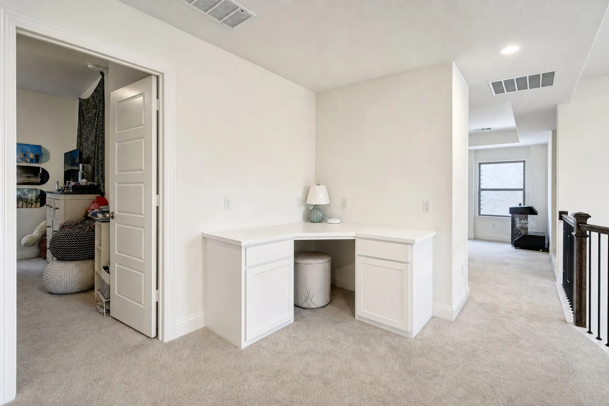 A study nook with built-in desk is just outside the upstairs bedrooms.