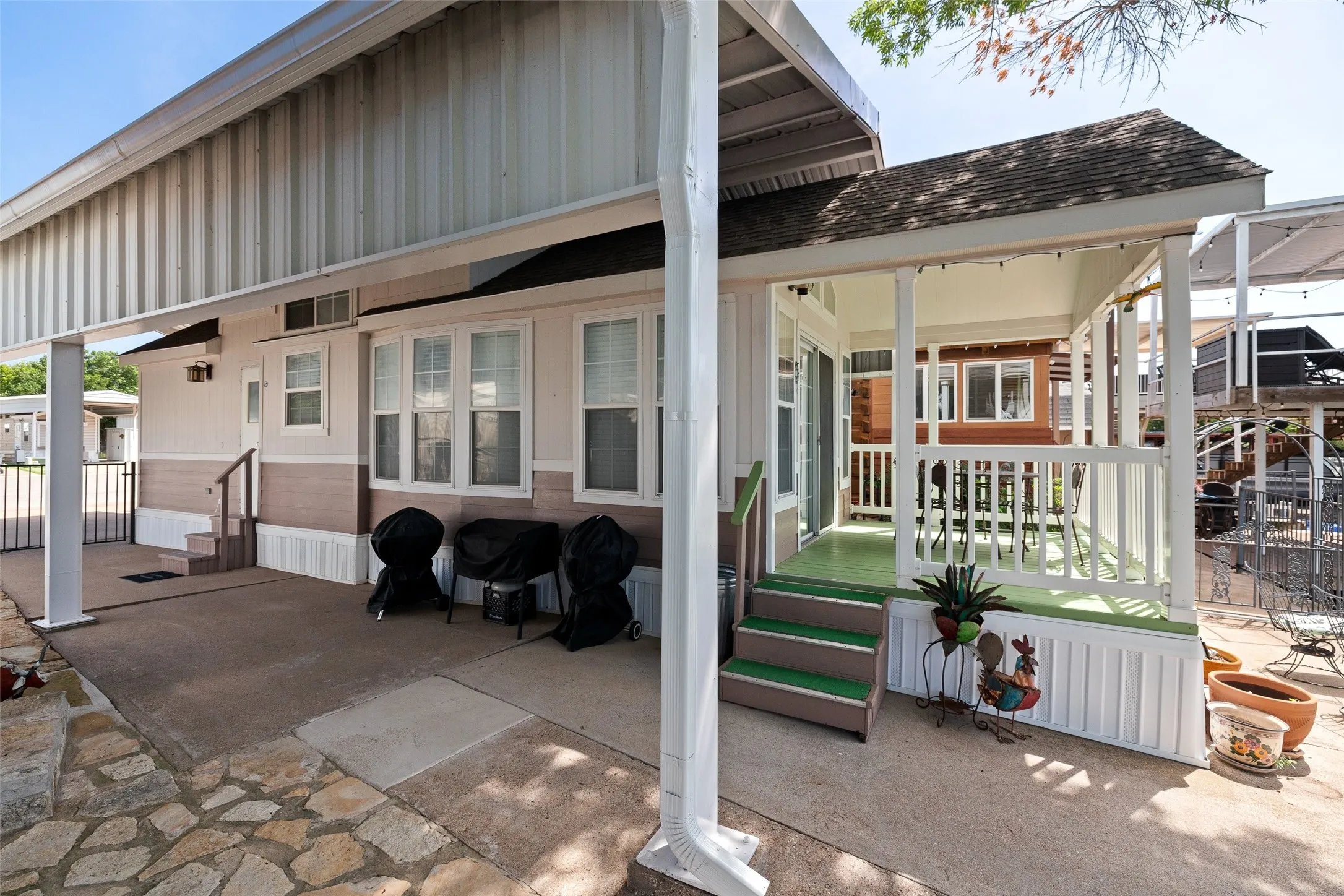 Side view of home with total cover over it