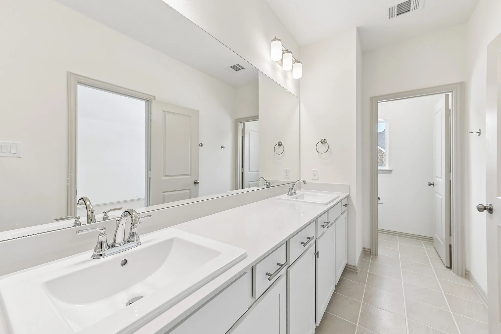 Plenty of room for two in this delightful owner's bath!