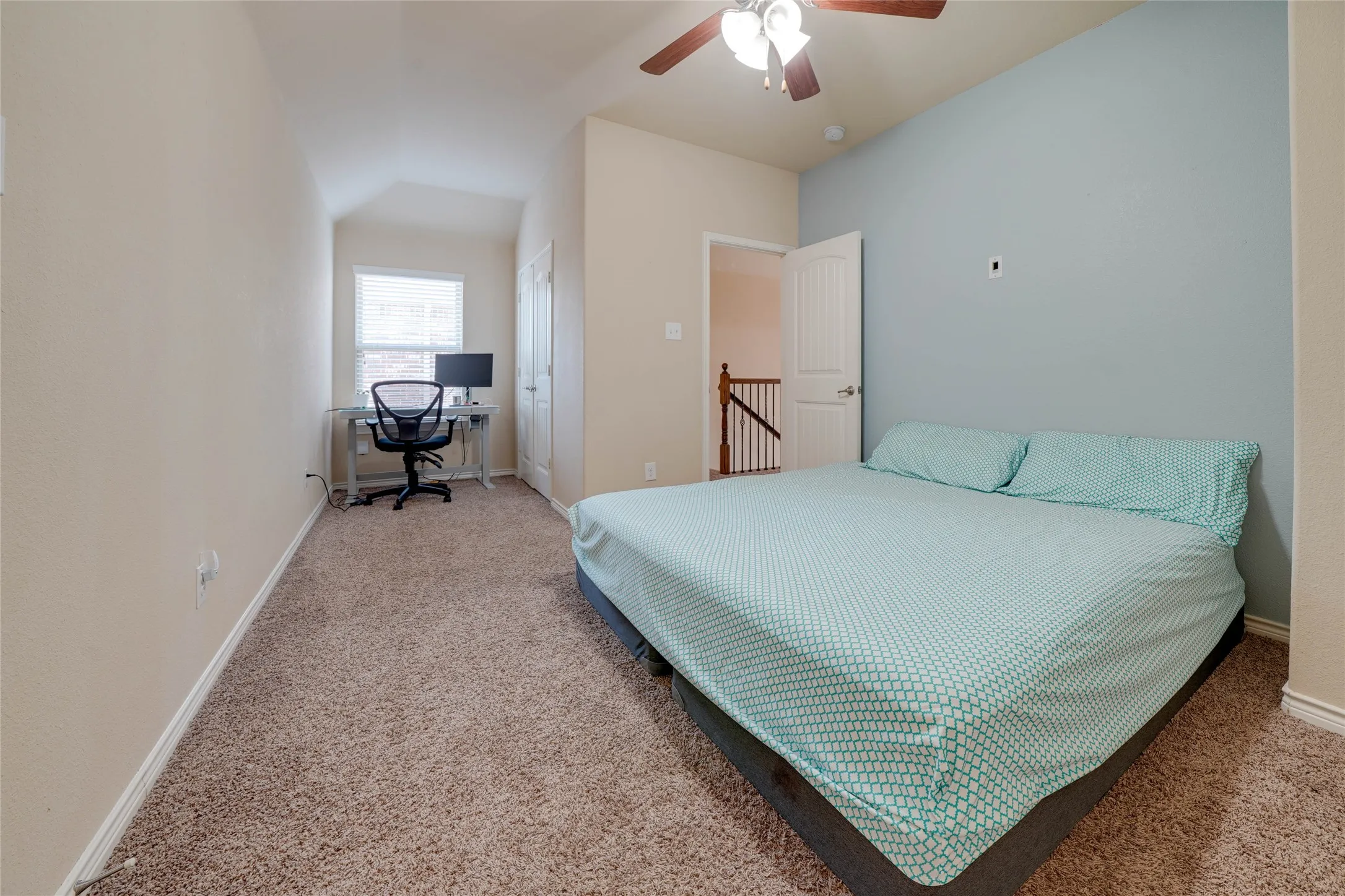 Bedroom with carpet and ceiling fan