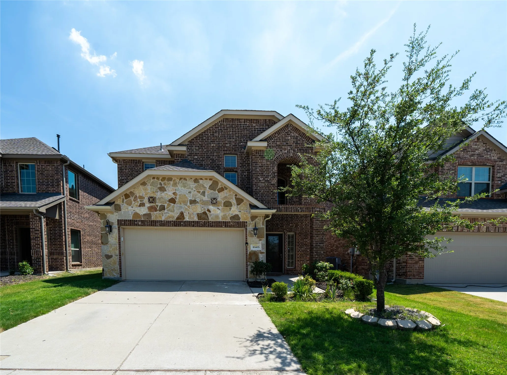 View of front of property with a front lawn