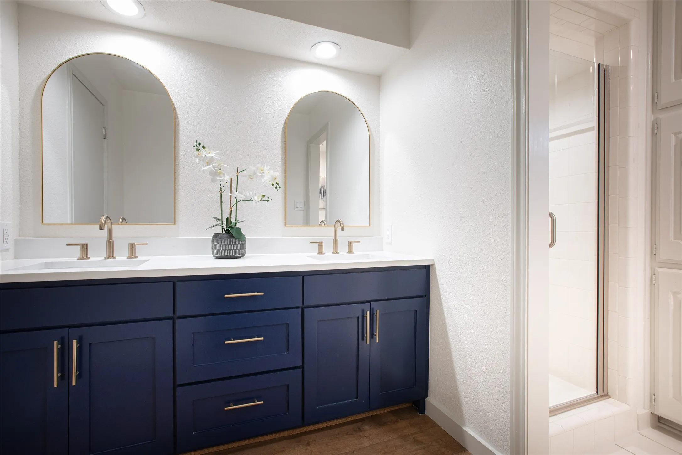Primary vanity with walk in shower