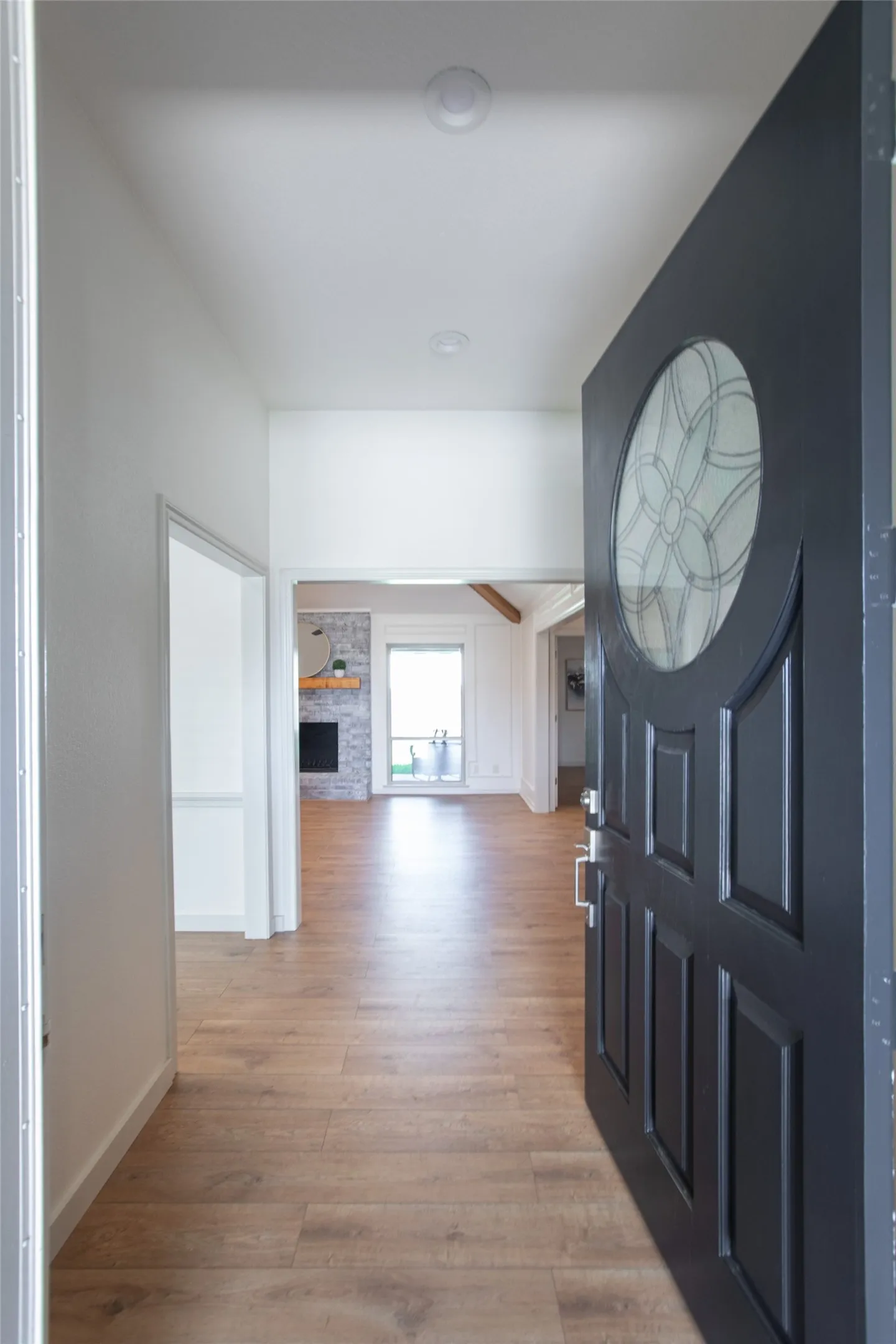 Grand entrance with heavy oversized door and new hardware