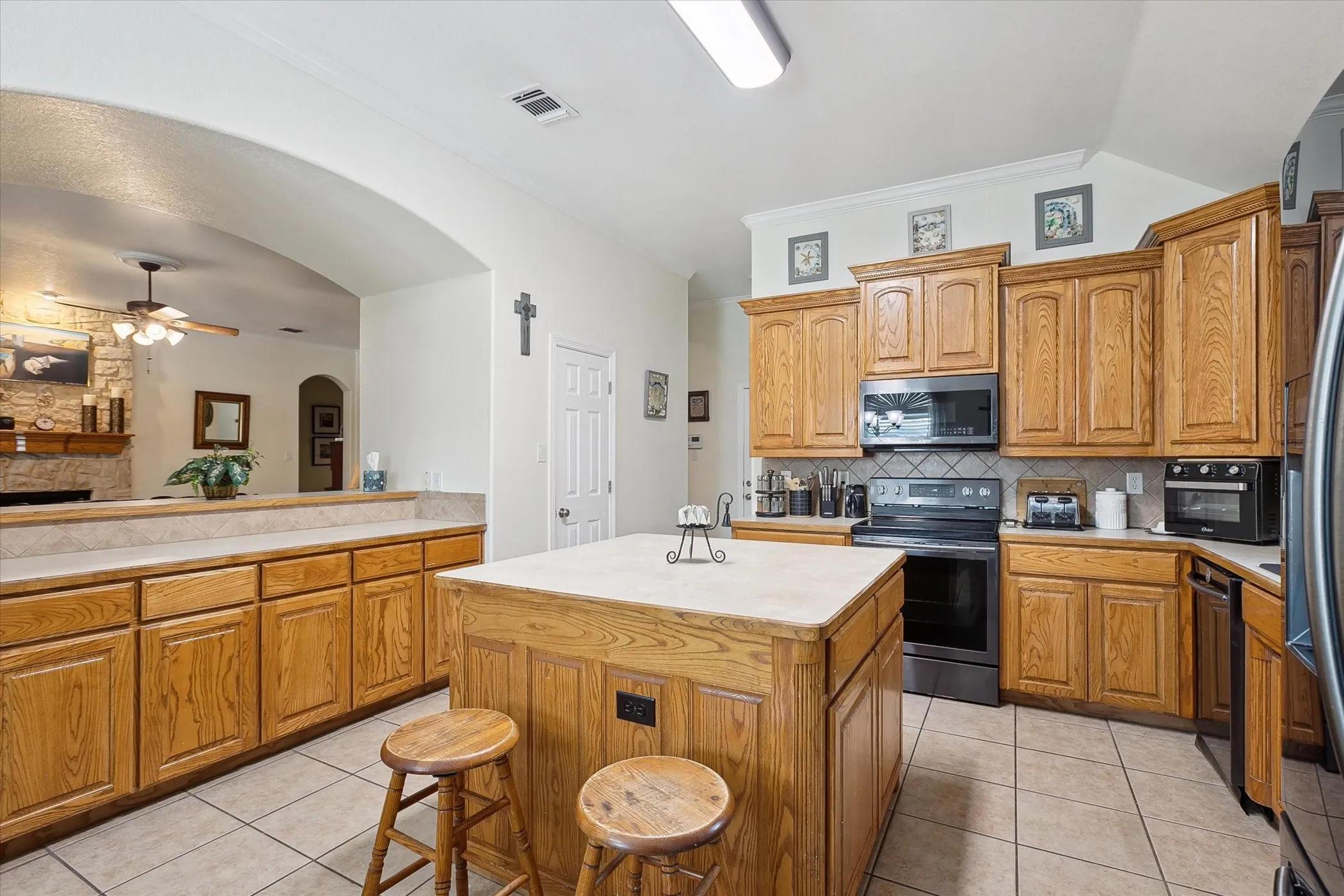 Kitchen featuring island and nice bar