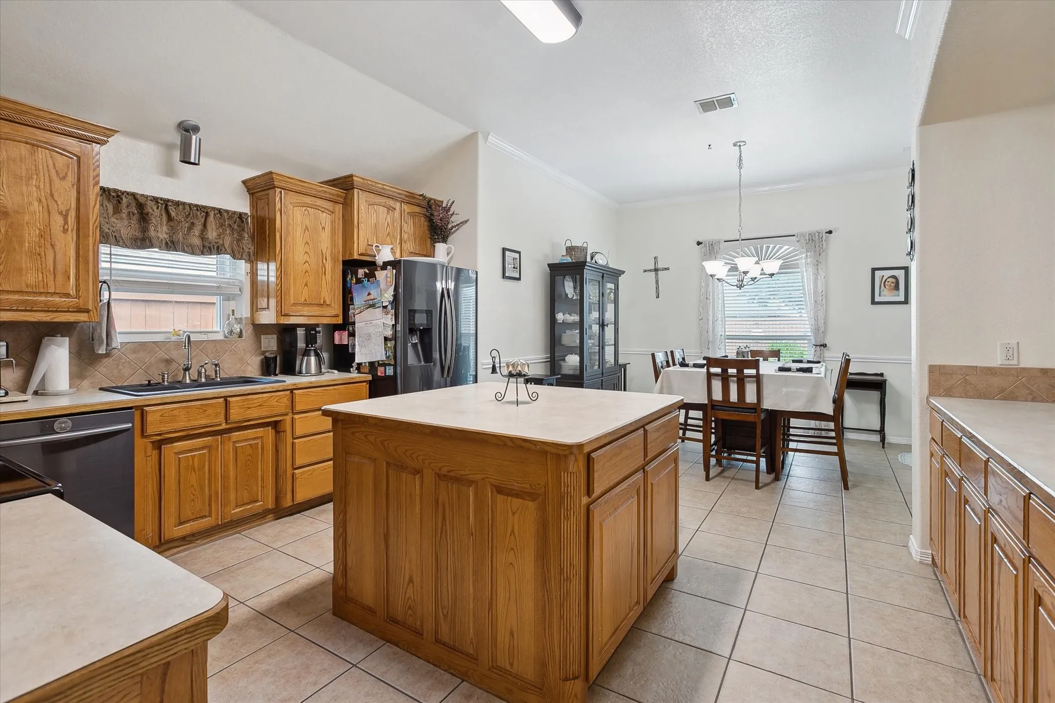  Spacious kitchen featuring large center island.