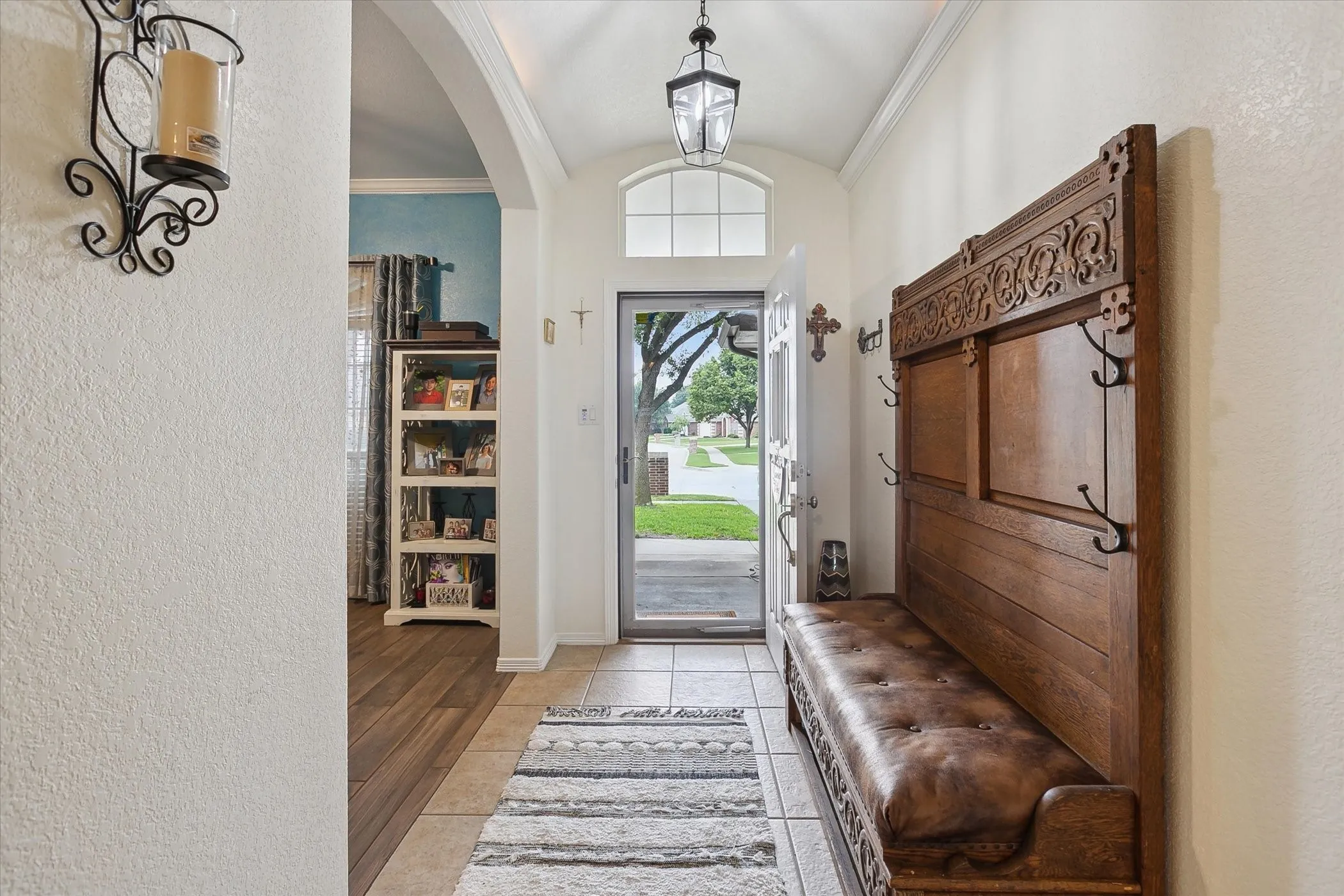 Entryway flows easily into home office and living room.