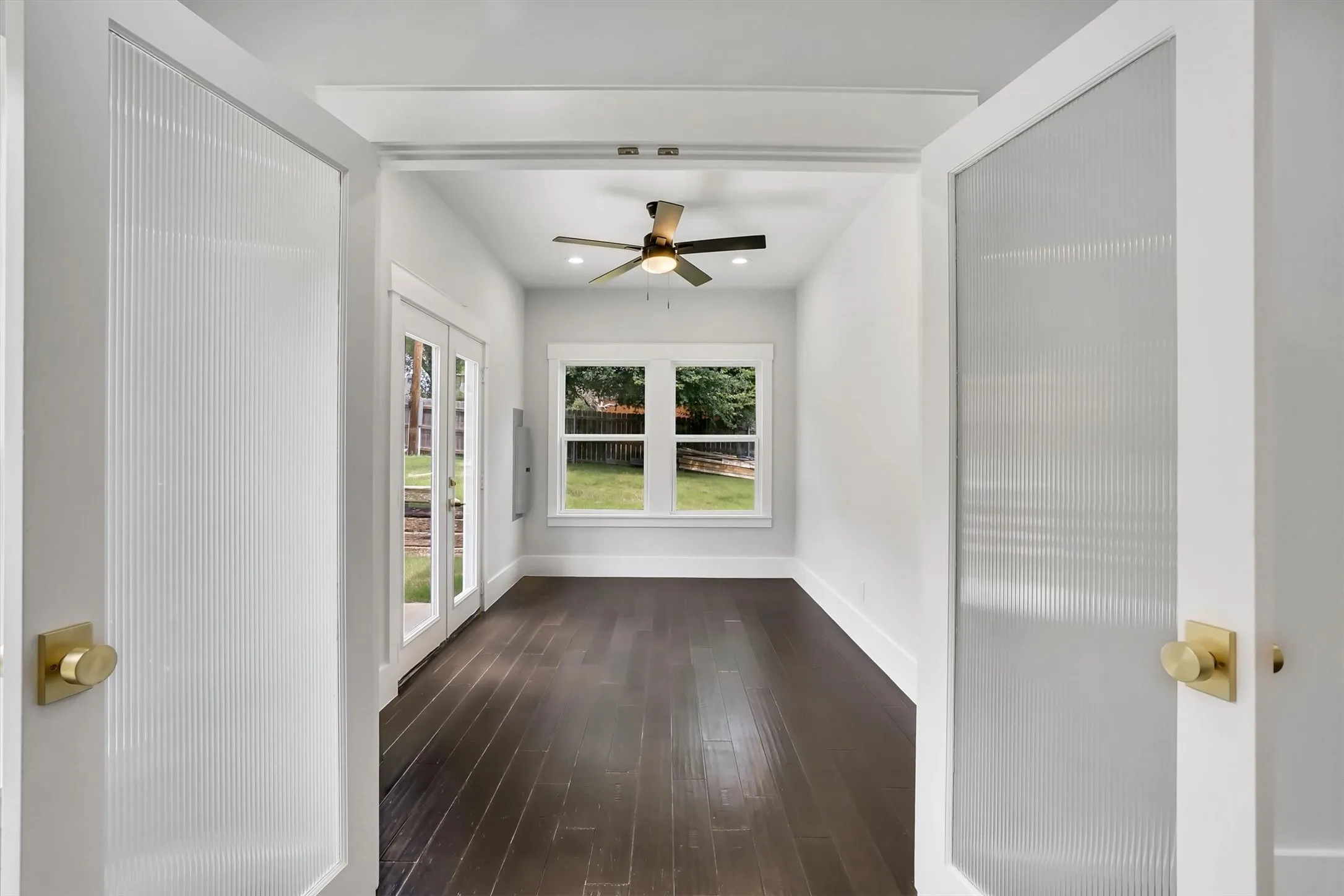 Reeded glass French Doors inviting you into your bonus room/play room