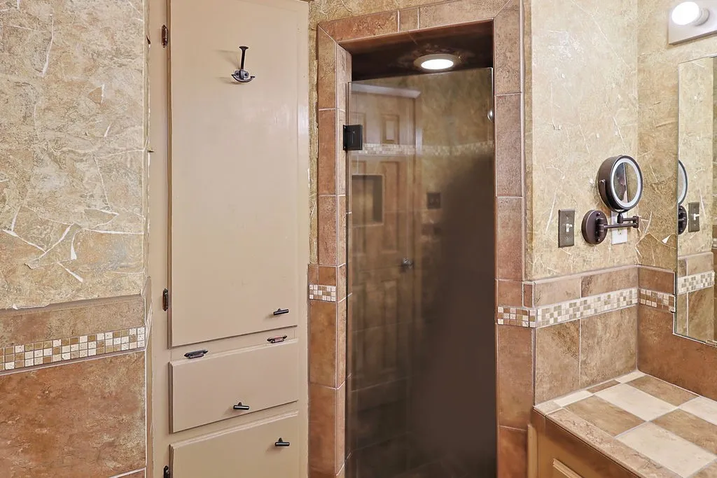 Built-in storage cabinetry offering multiple compartments