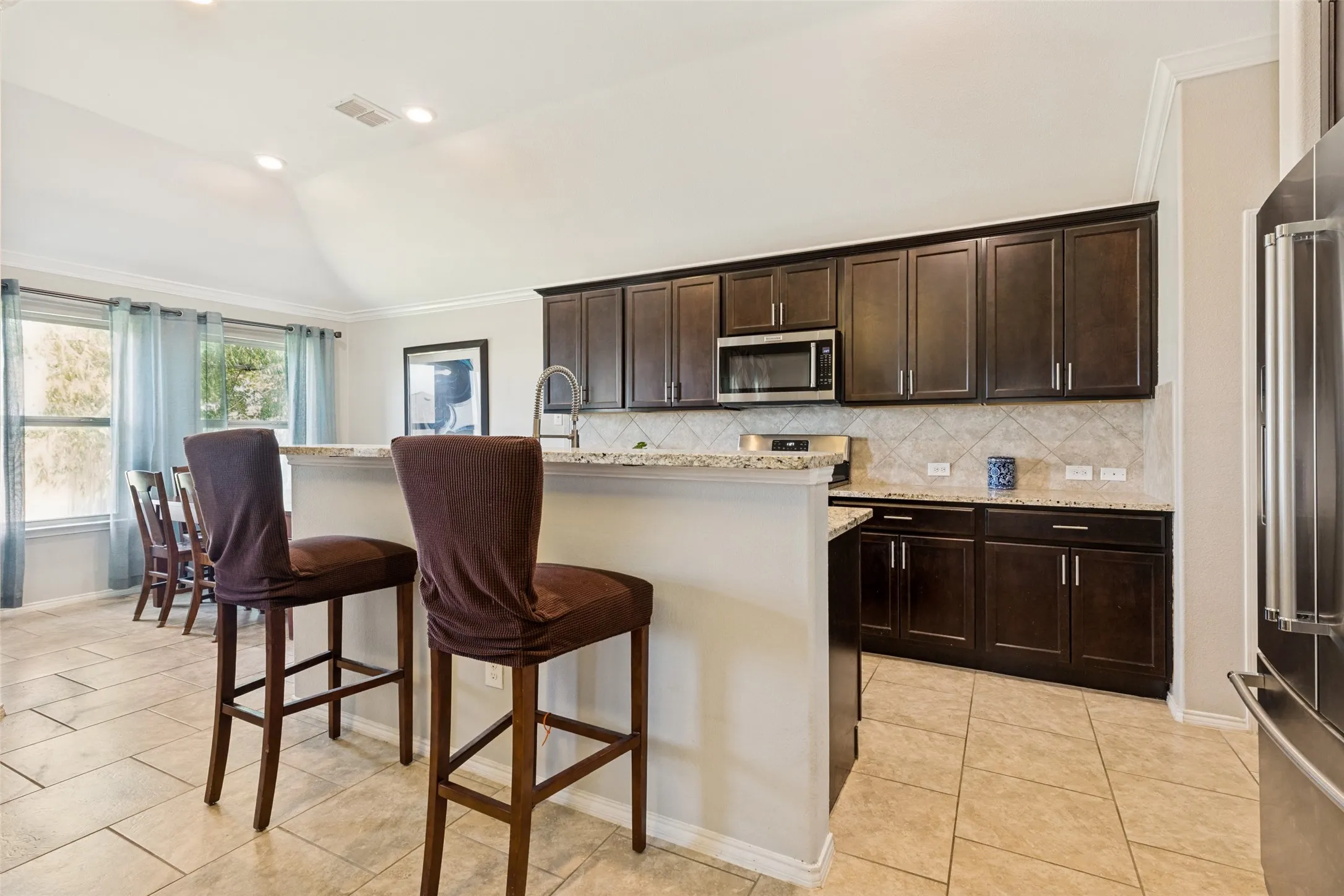 Lots of additional seating with barstools