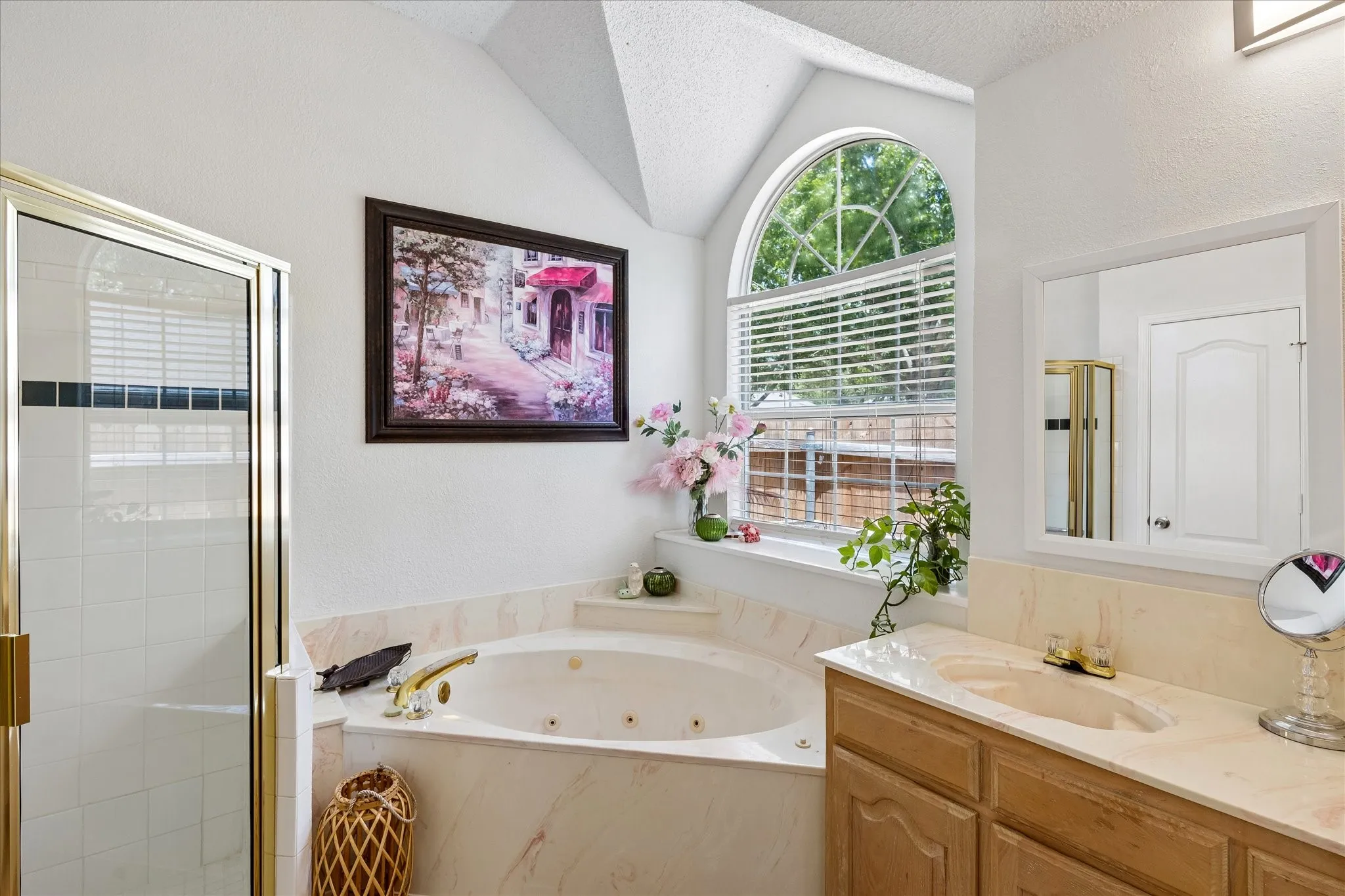 Separate vanities, separate shower, a linen closet, walk in closet and more.