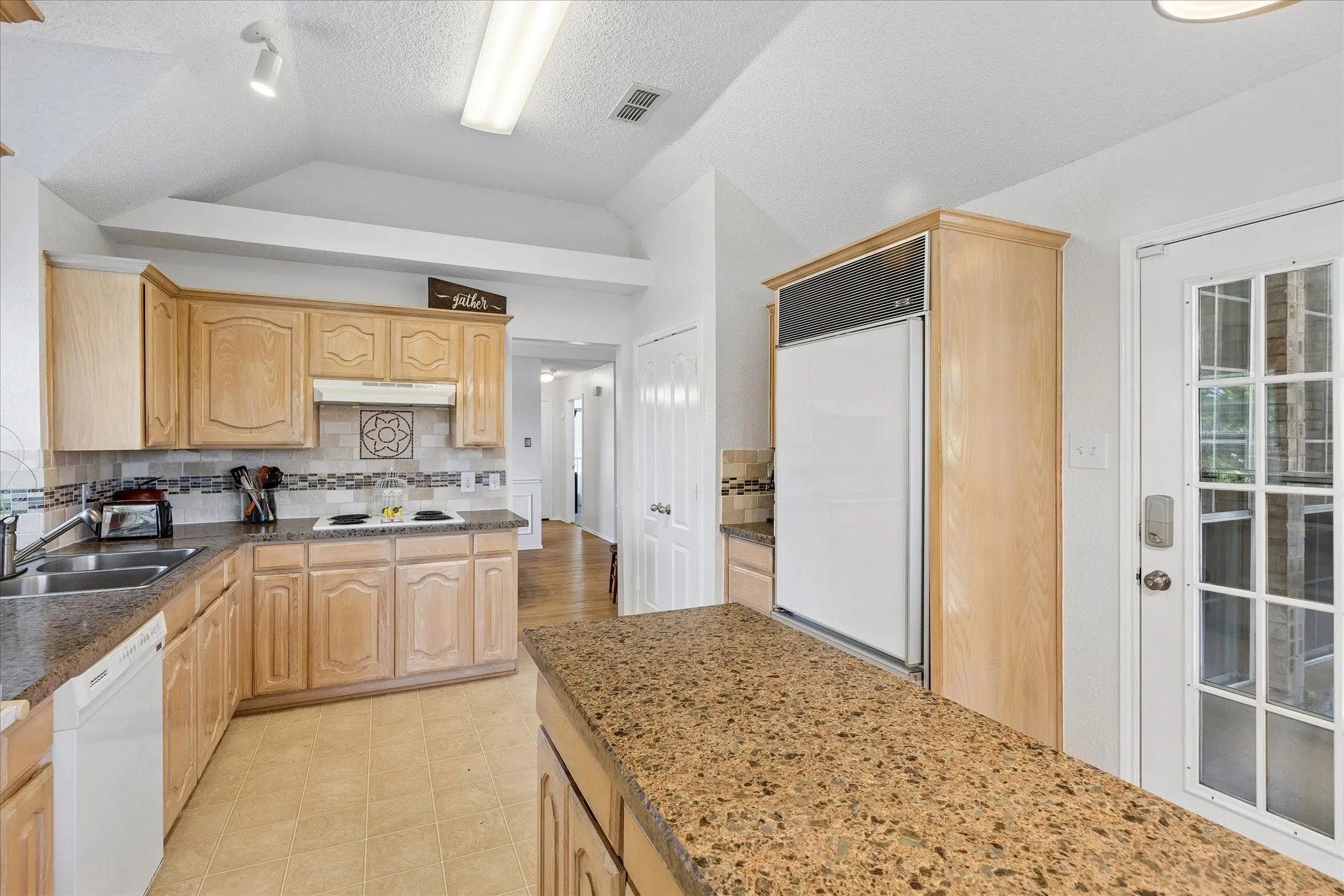 Island offers even more counter space.. And, don't forget the pantry.