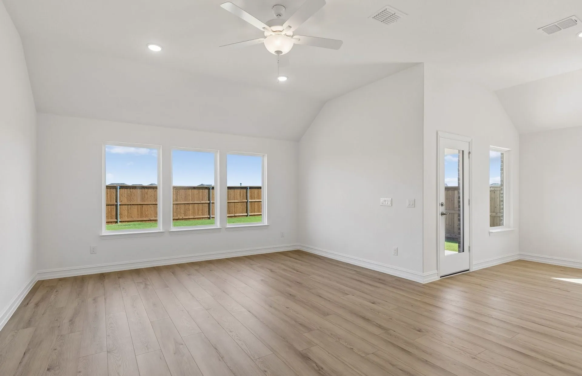 Spacious gathering room with large windows