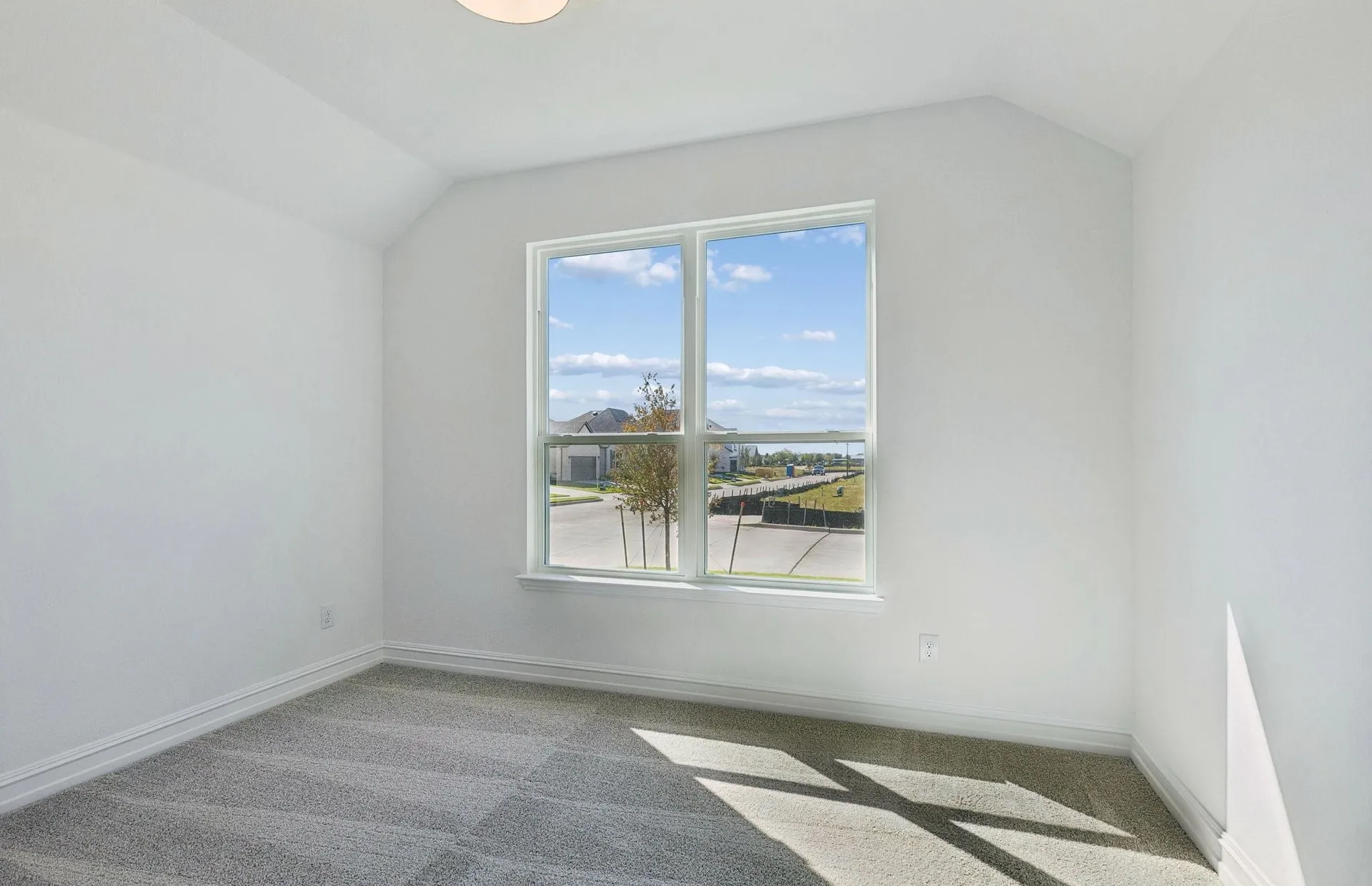 Spacious walk-in closet in primary suite