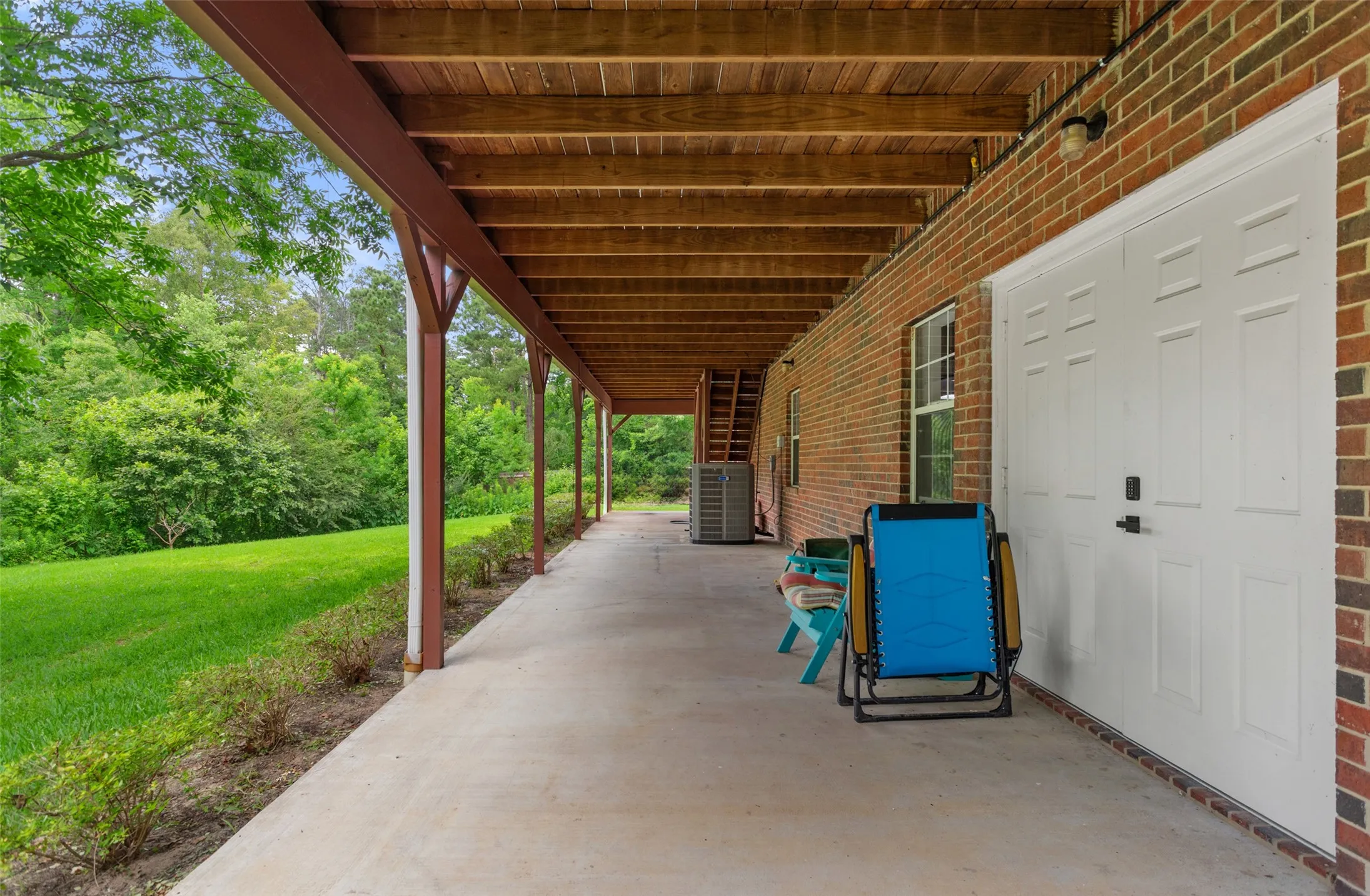 Under back deck - garage access