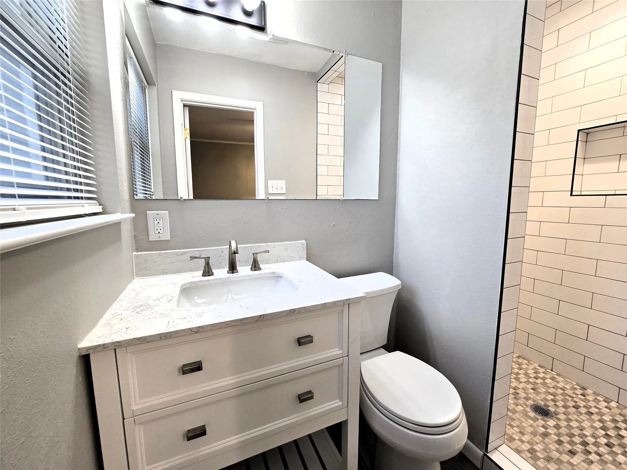 Newly remodeled primary bath with shower
