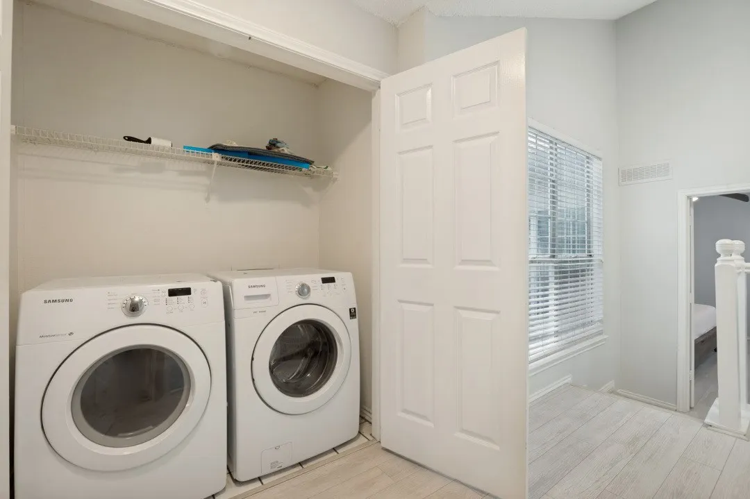 Dedicated laundry closet with wire shelving