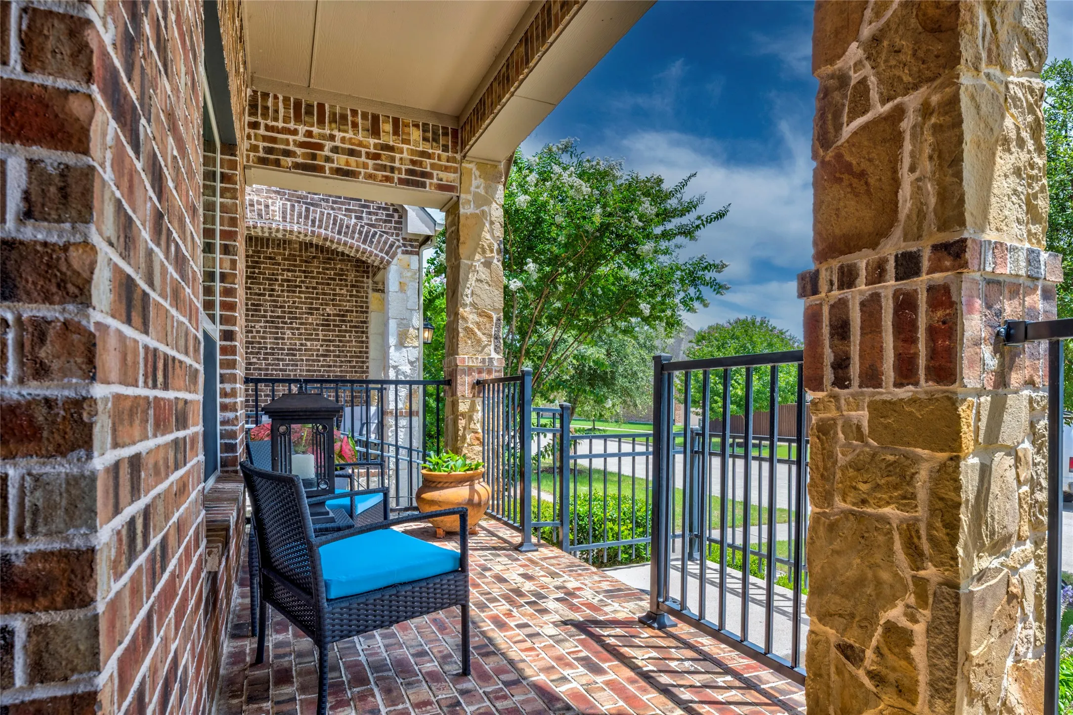 Front porch is upgraded with brick paver patio.