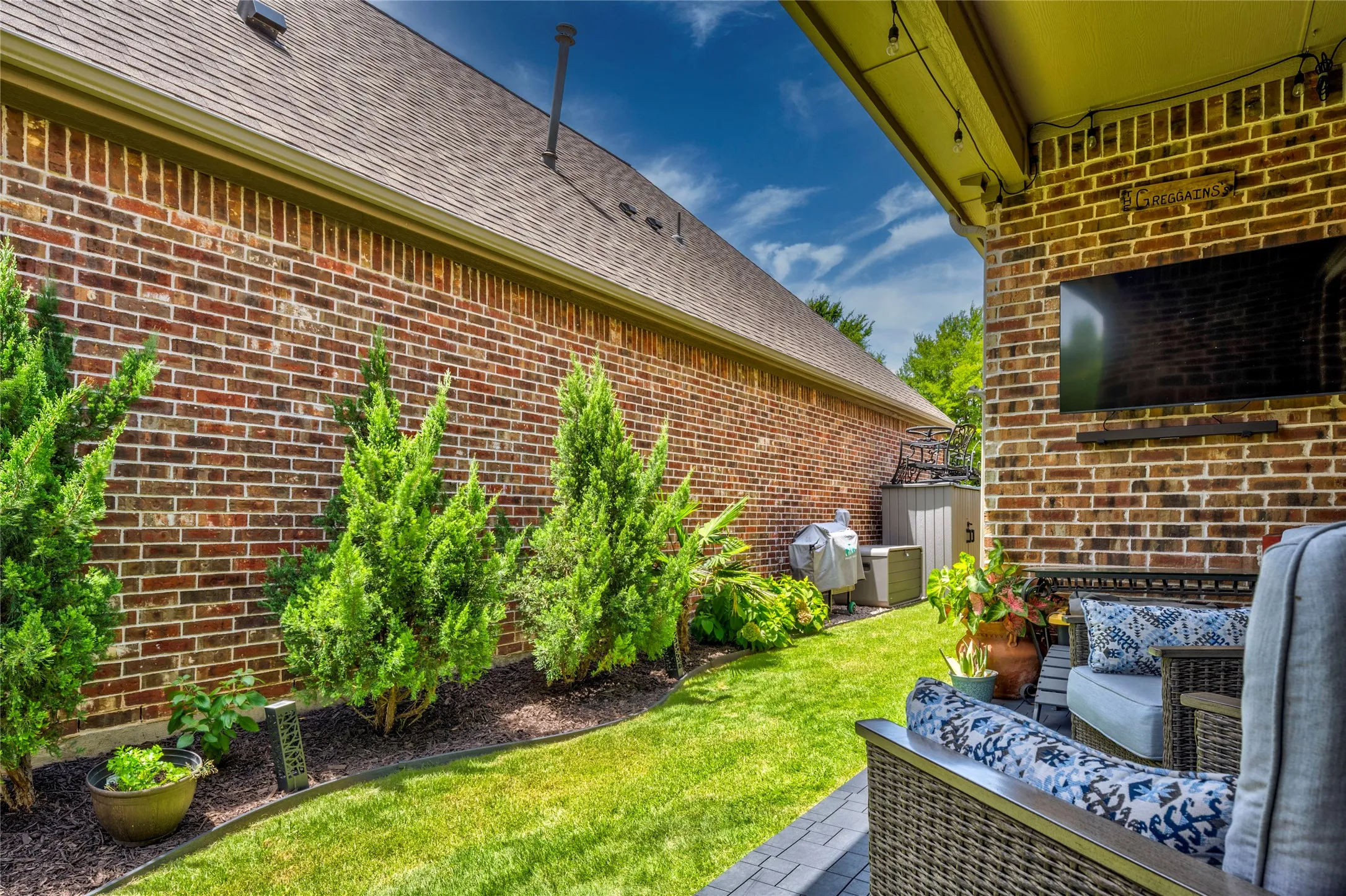 Meticulously maintained yard creates a beautiful setting to enjoy outside!