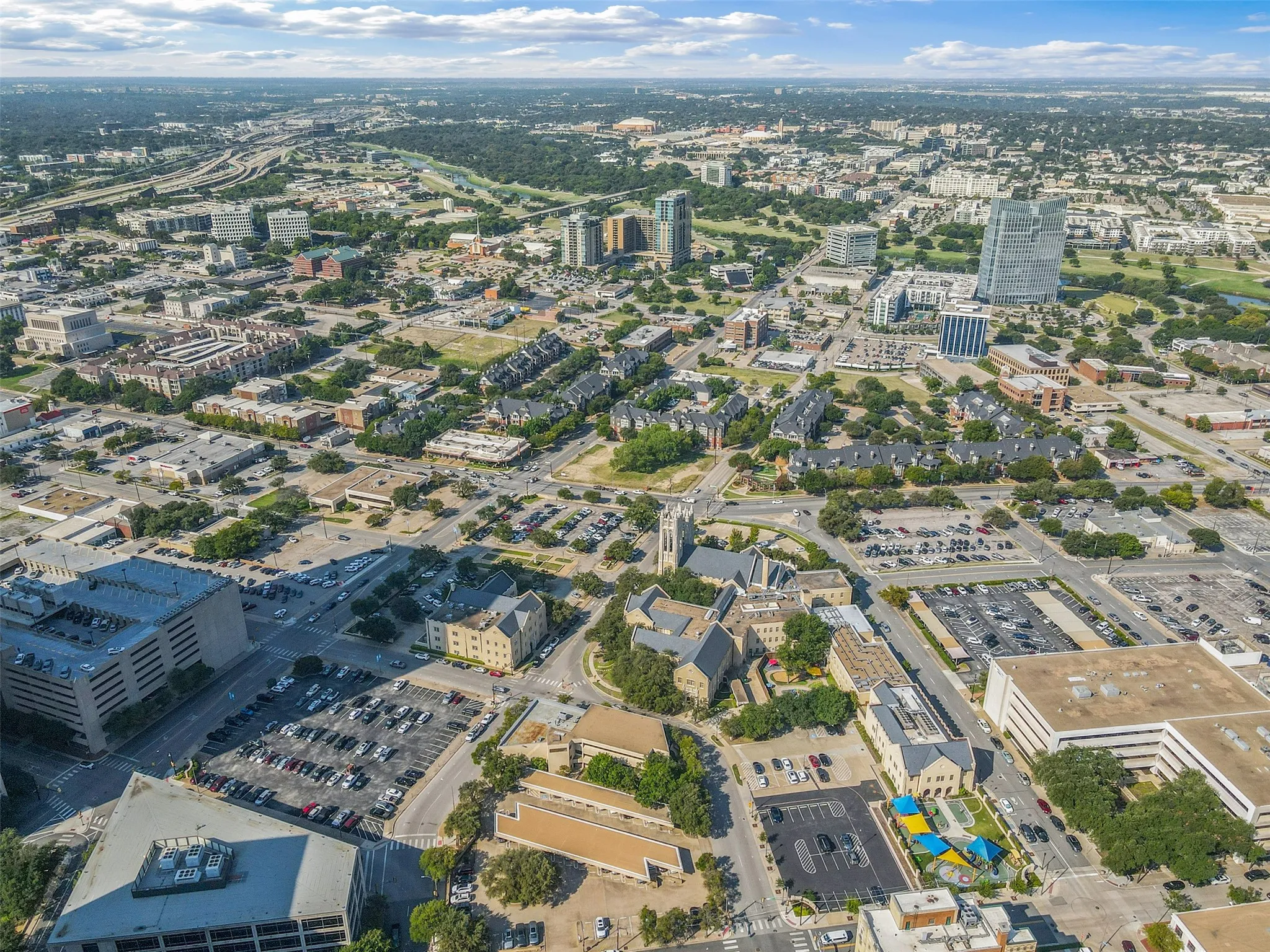 Expansive aerial perspective showcasing a vibrant urban landscape with diverse architectural styles
