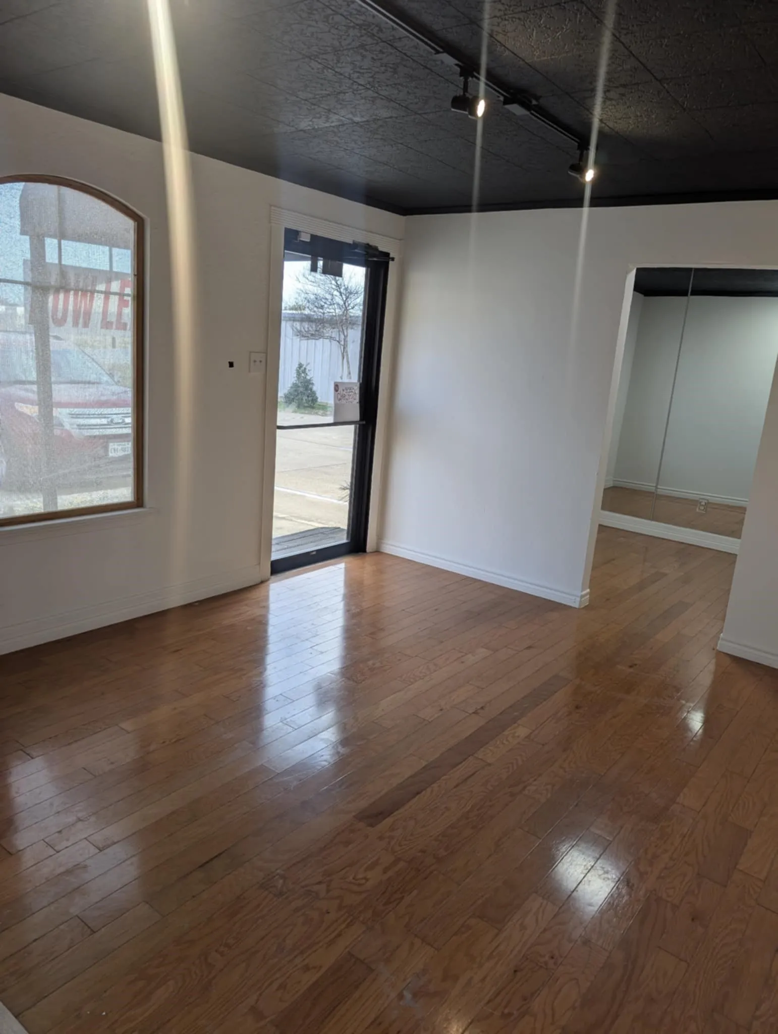 Suite B entry or reception area.  Windows have custom solar screens.