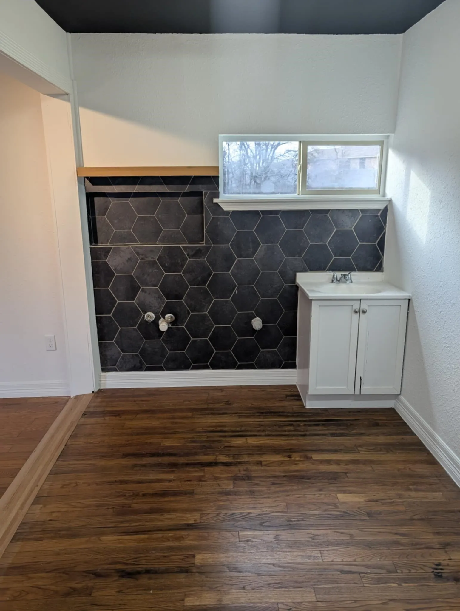 Suite B Space was previously a hair salon.  There are connections for shampoo bowls and a sink outside the restroom