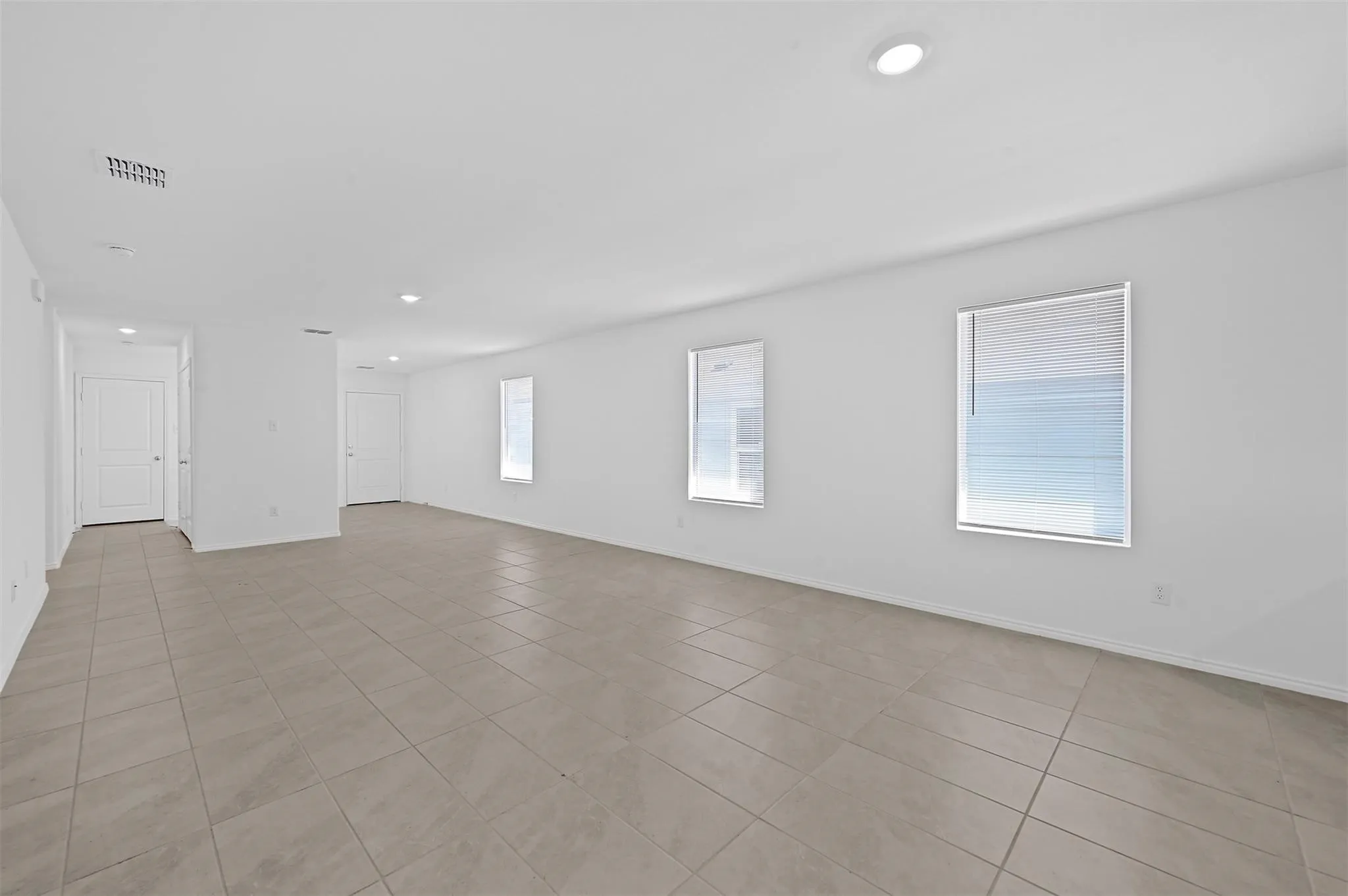 Living Room featuring light tile floors