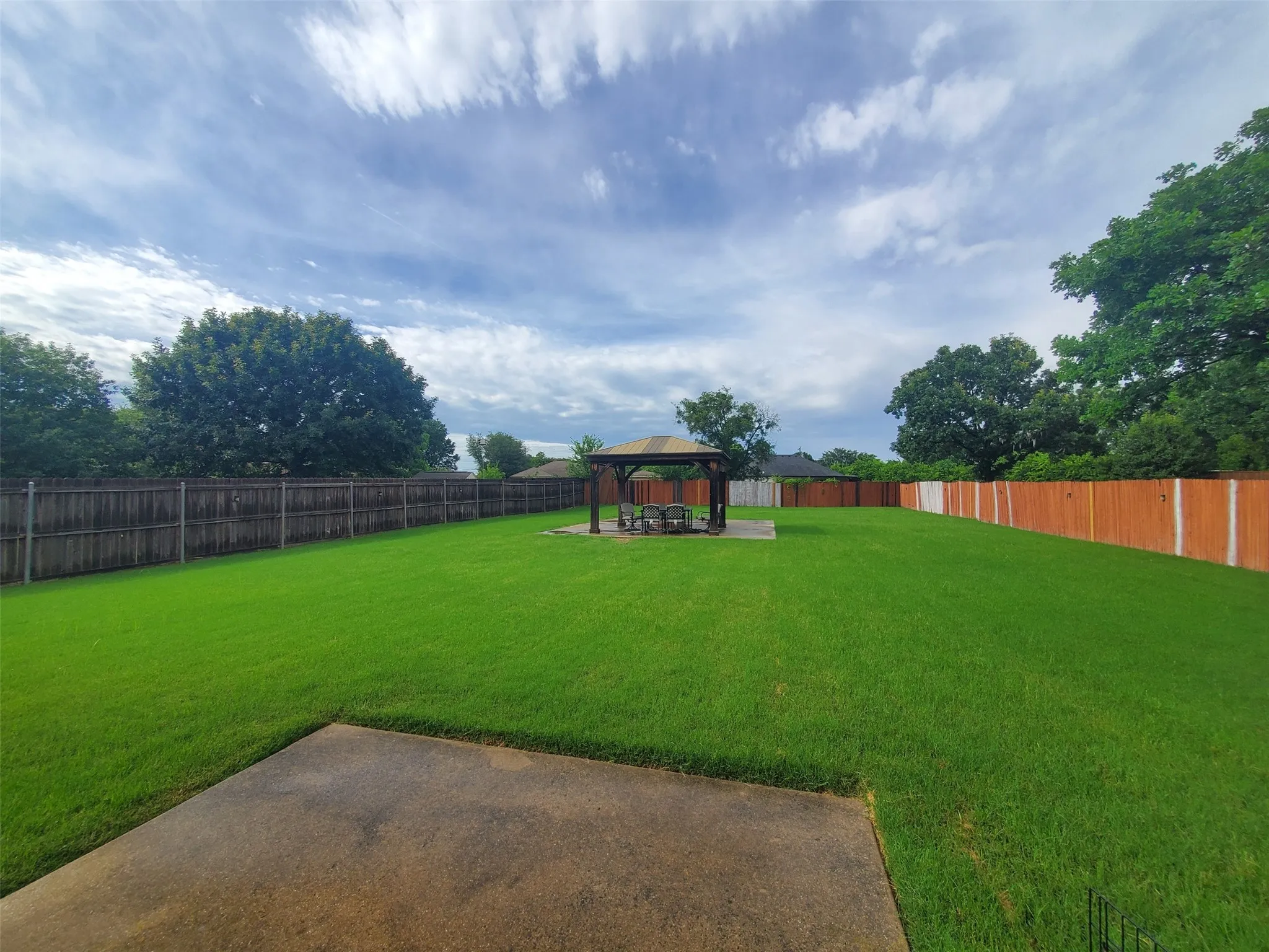 Patio off the backdoor leading to back yard