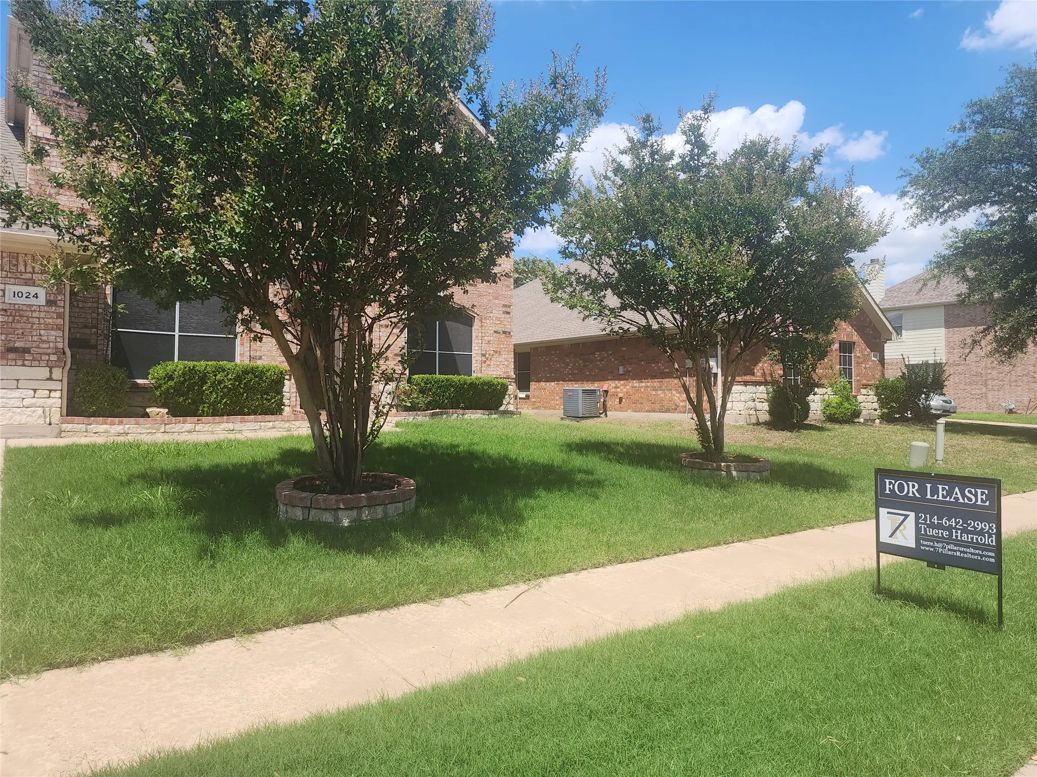 Landscaped front yard. Great curb appeal