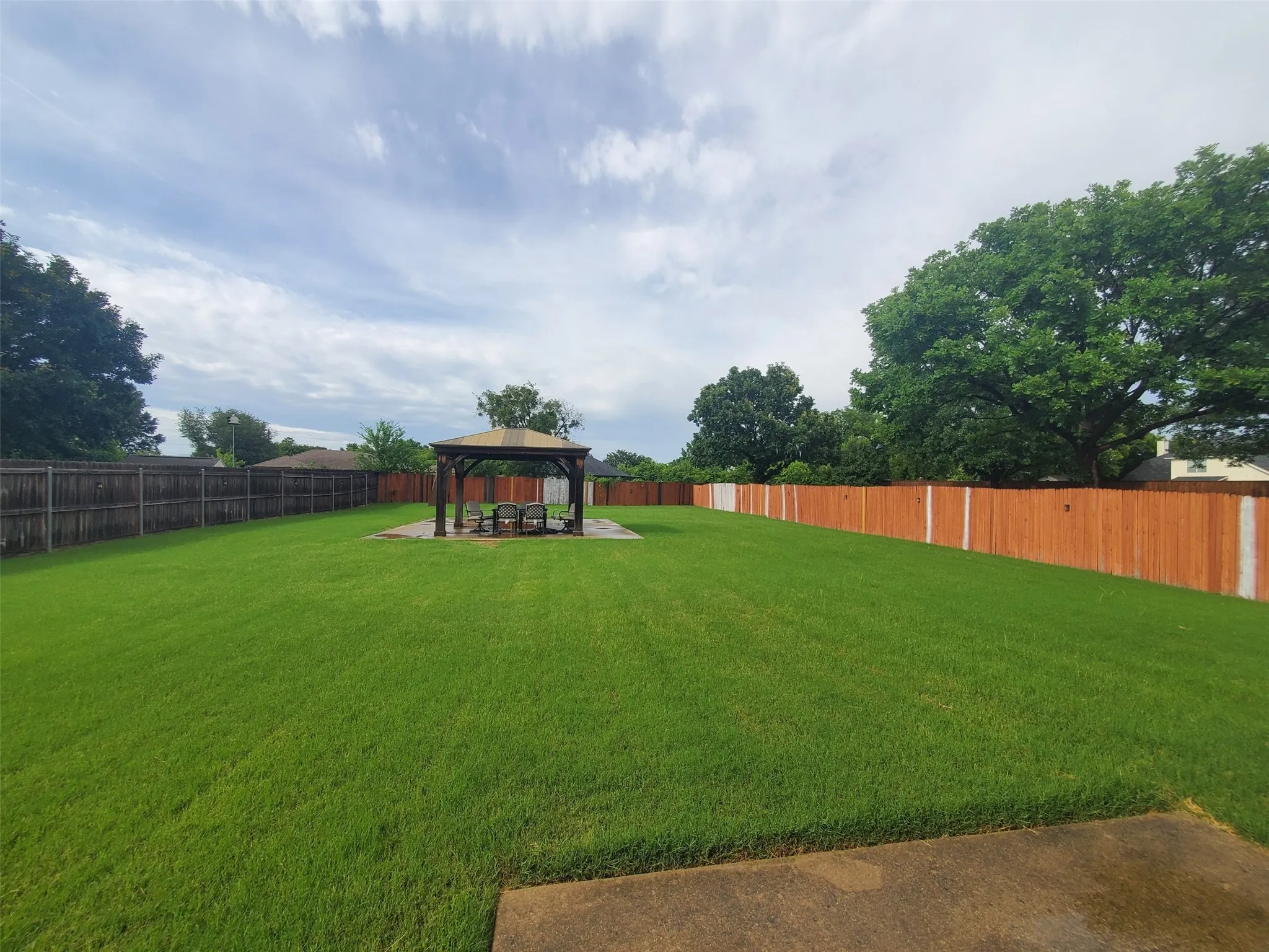 Large backyard, perfect for entertaining.