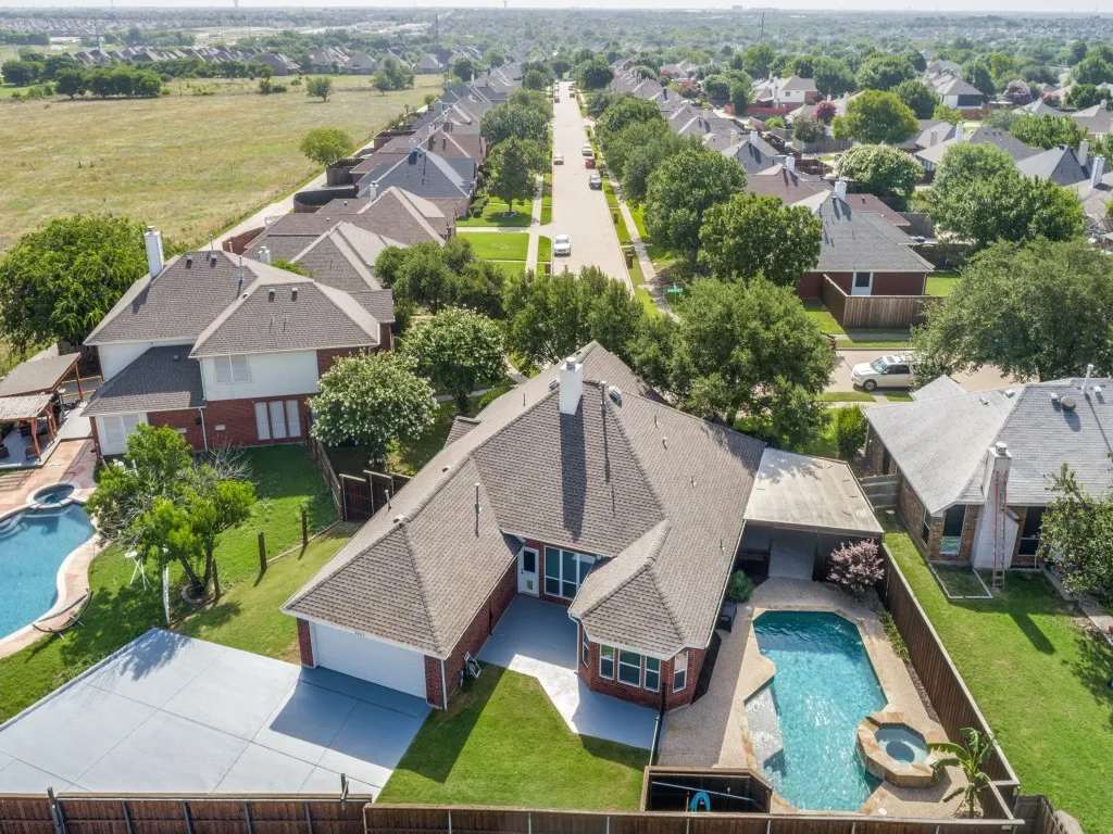 Just look at all the parking space for all your favorite toys!  Lots of green space and a pool!