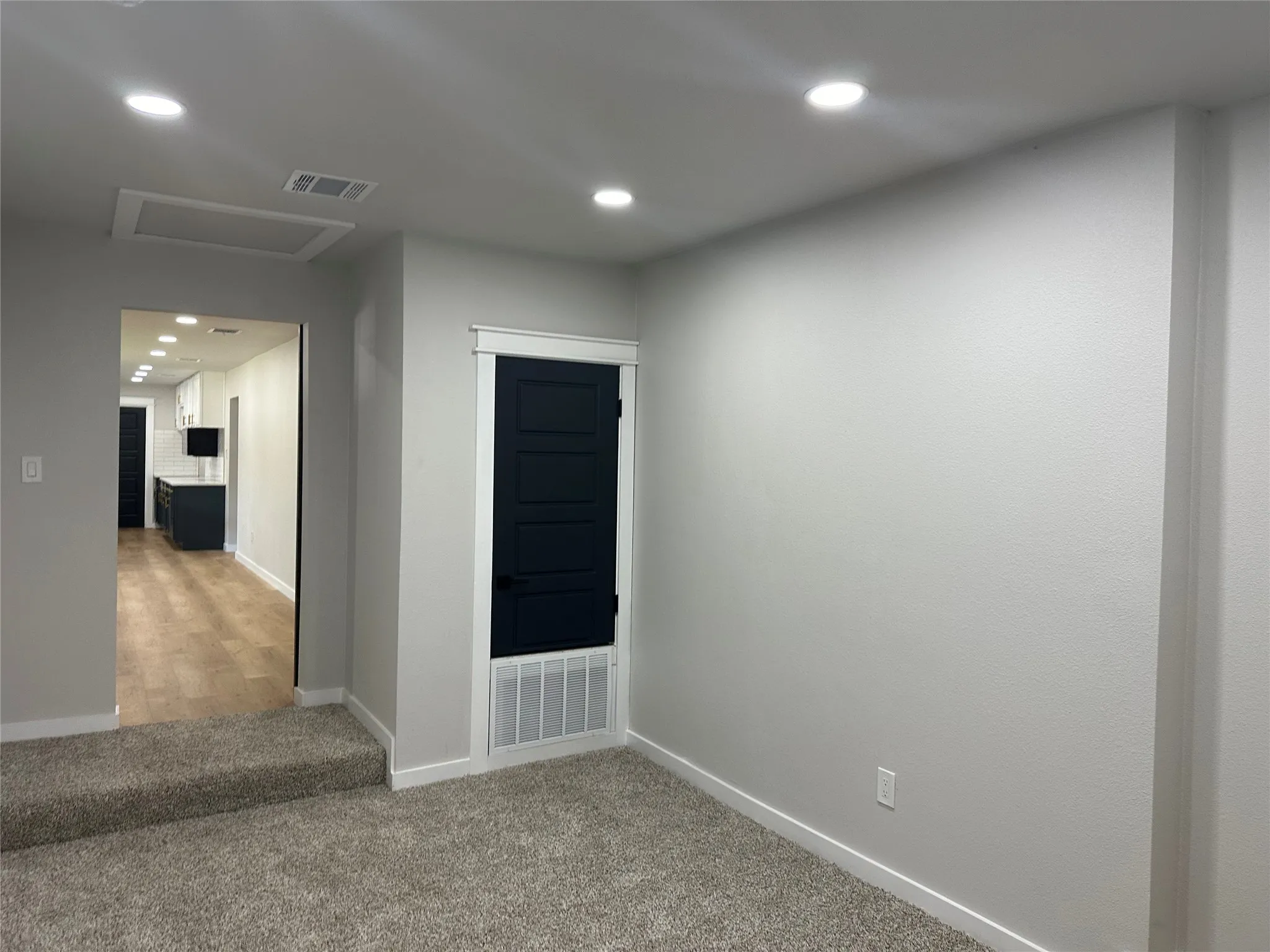 Unfurnished room with light hardwood / wood-style flooring