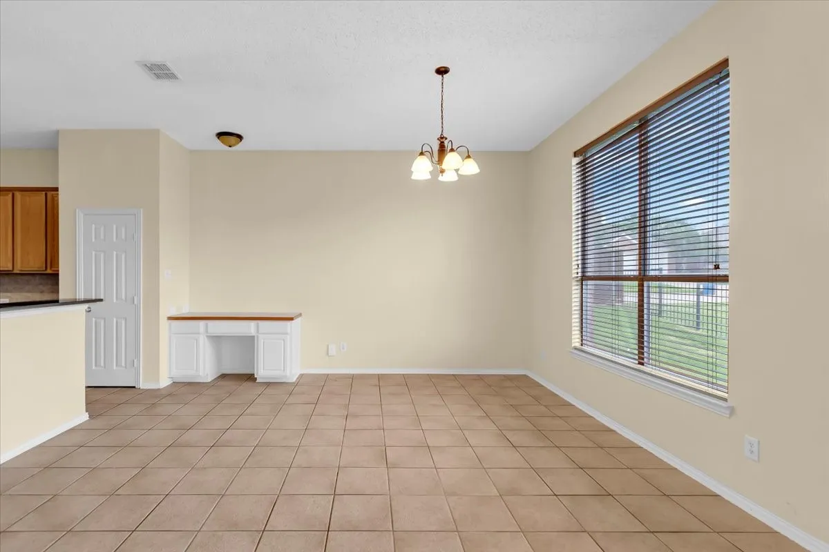 Living room to breakfast room with a desk