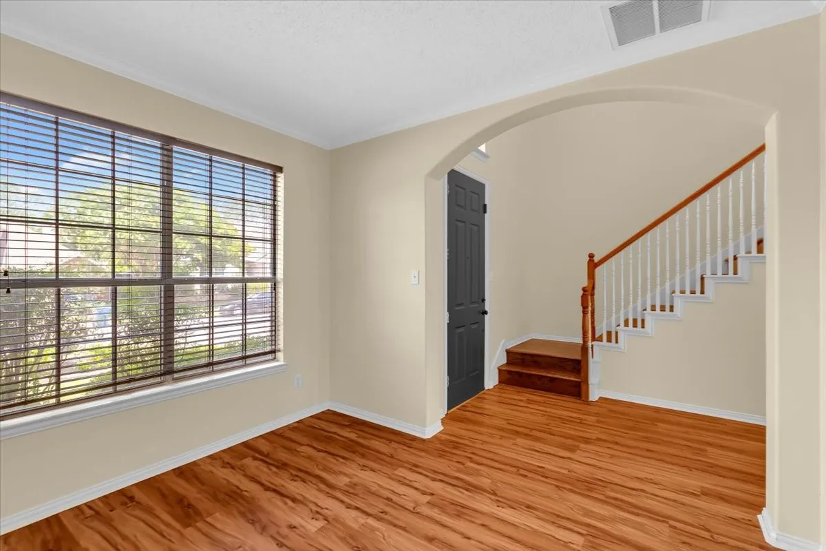 View from 2nd living area to hall and front door
