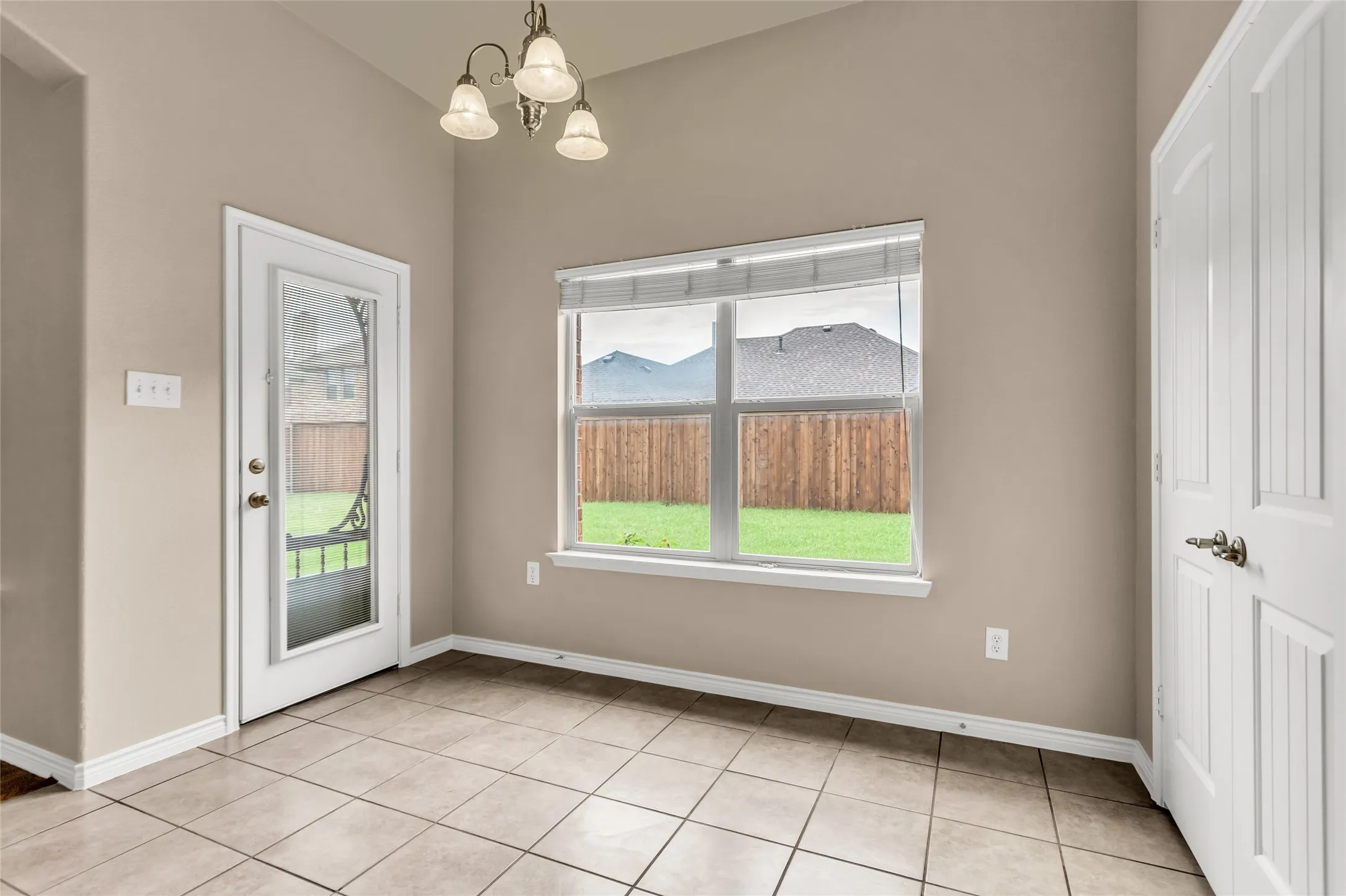 Breakfast with lots light with door to patio.