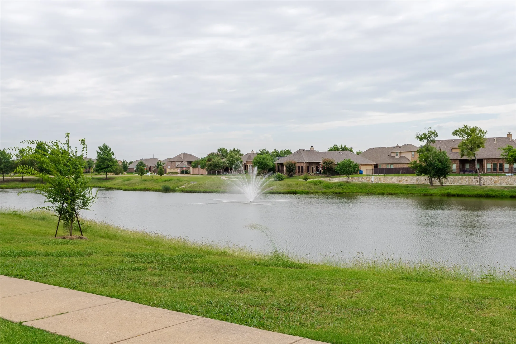 Water view featuring nearby suburban area