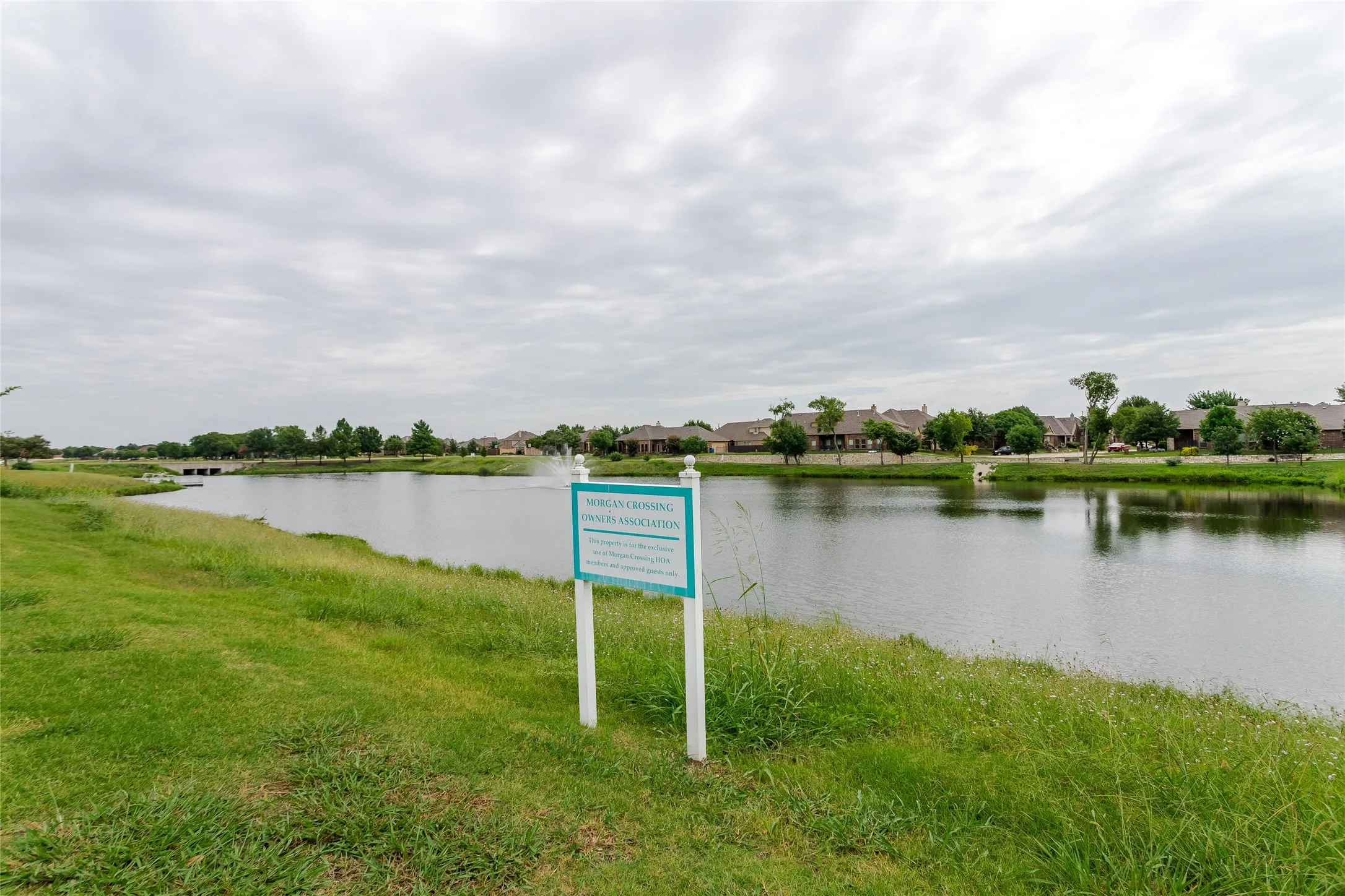 Water view featuring nearby suburban area