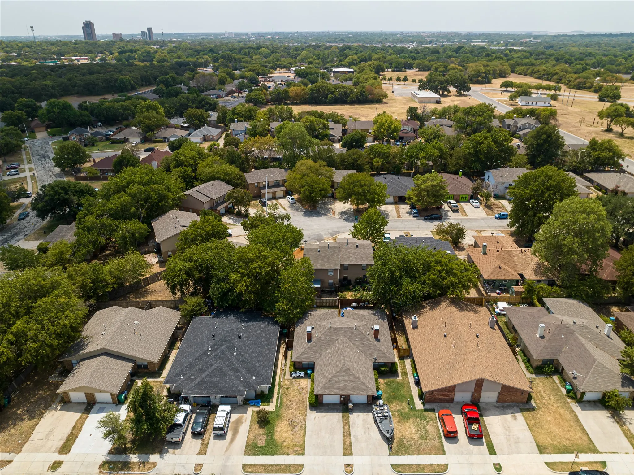 Birds eye view of property with a residential view